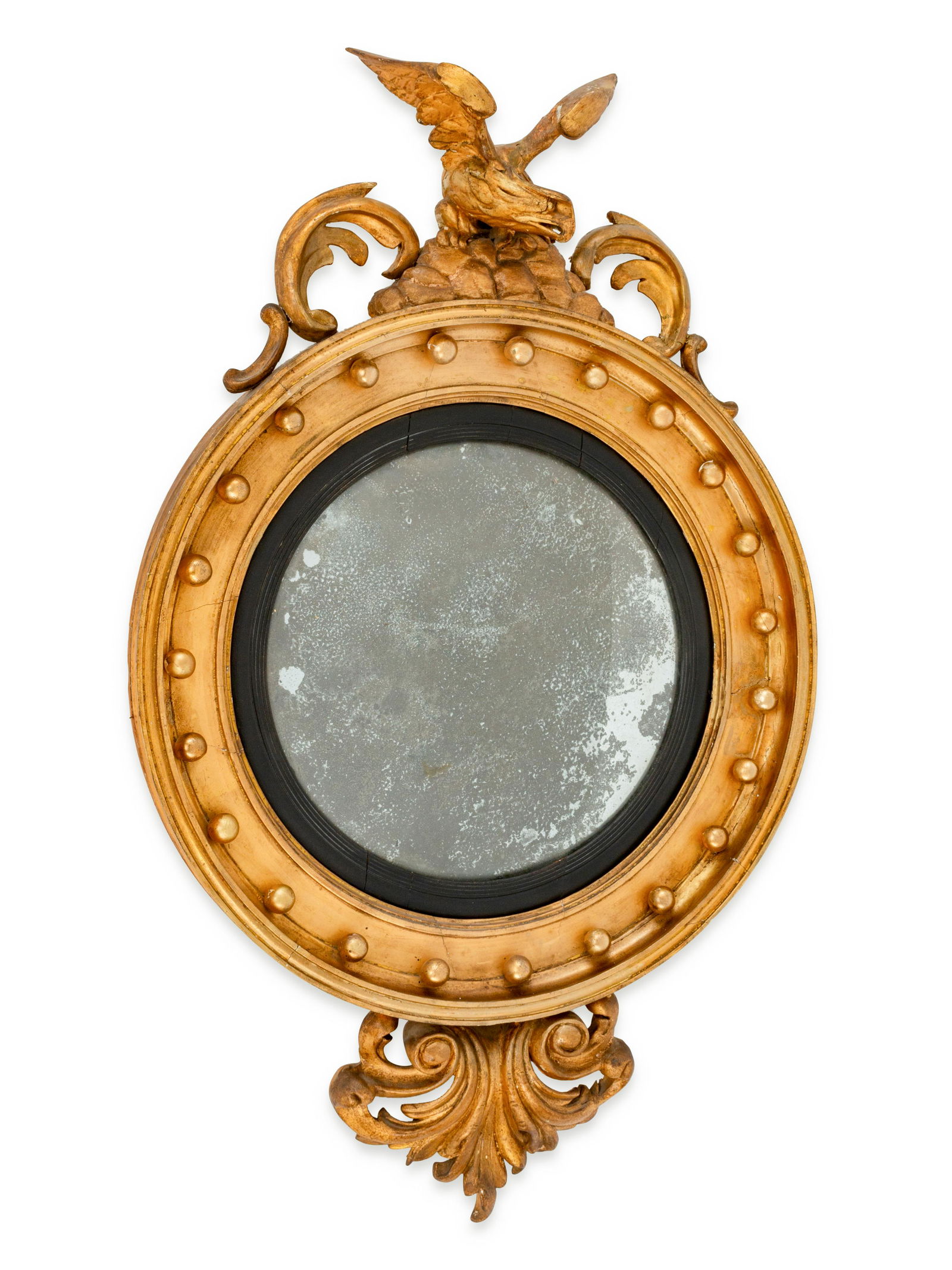 A Regency Style Giltwood Convex Mirror Height 38 x: A Regency Style Giltwood Convex Mirror 19TH CENTURY Height 38 x width 23 1/2 x depth 5 1/2 inches.