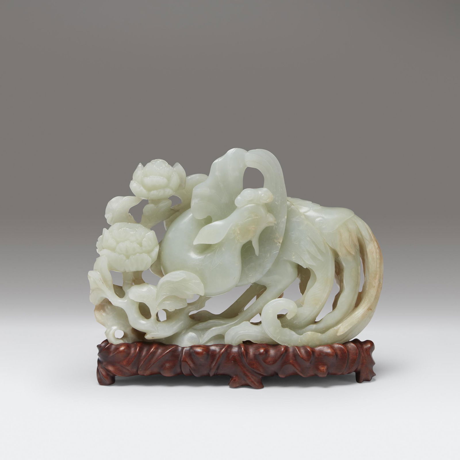 A Chinese pale celadon jade carving of a phoenix and (1 of 3)