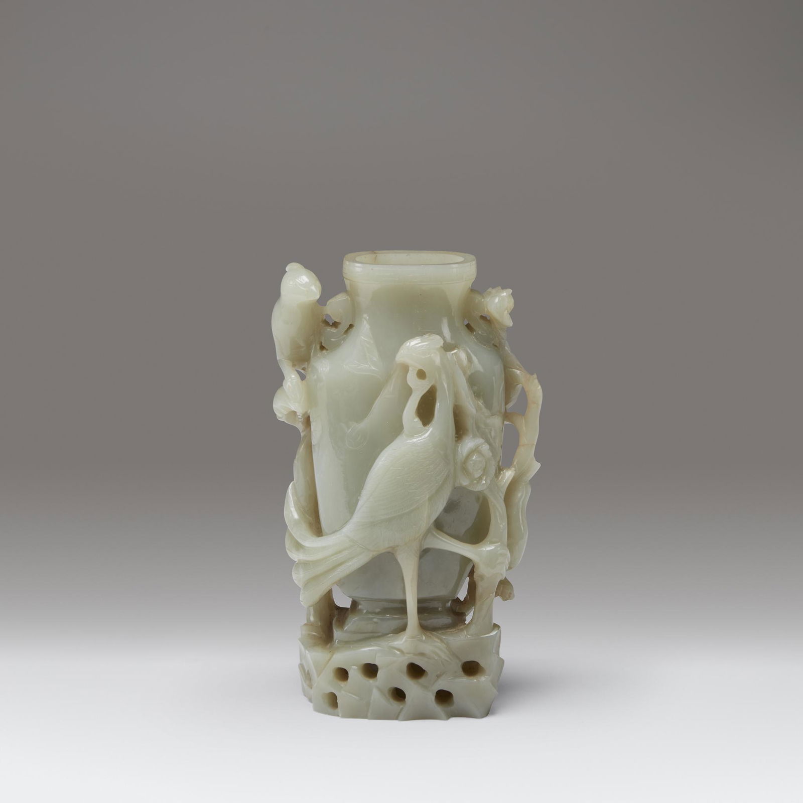 A Chinese celadon jade "Phoenix and Flowers" vase, 19th (1 of 1)