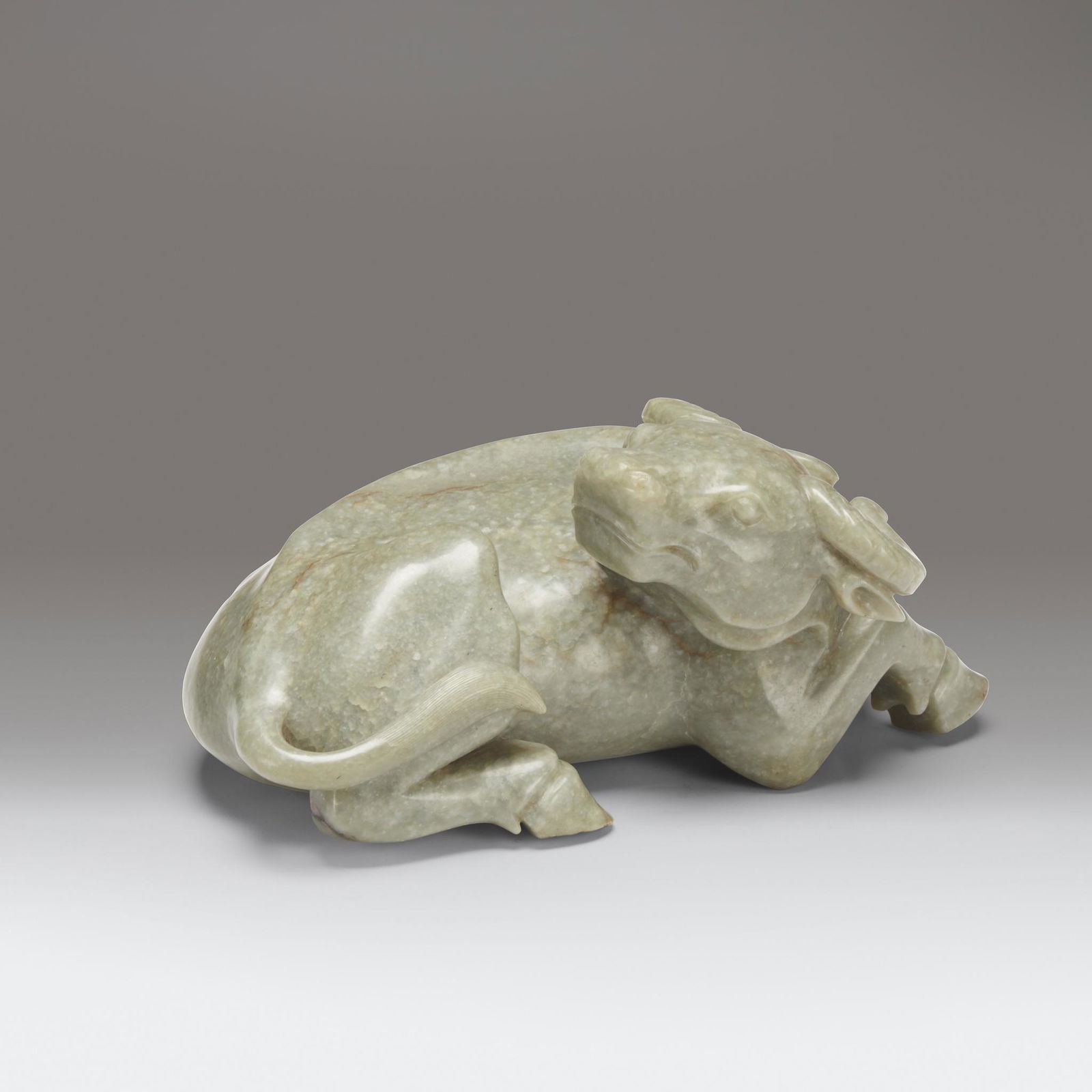 A large Chinese celadon-grey jade buffalo carving, (1 of 3)