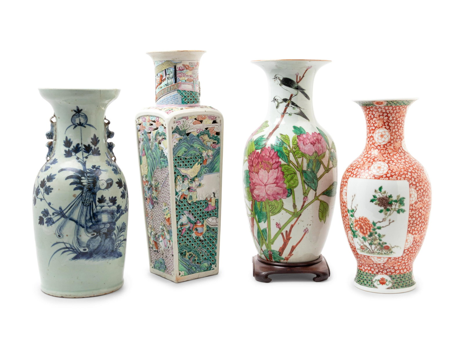 Four Chinese Vases Height of taller 16 1/2 inches, 42: Four Chinese Vases comprising a celadon and underglaze blue baluster vase with molded handles, a famille rose vase of square section carved and reticulated with figures in a landscape, a famille rose 