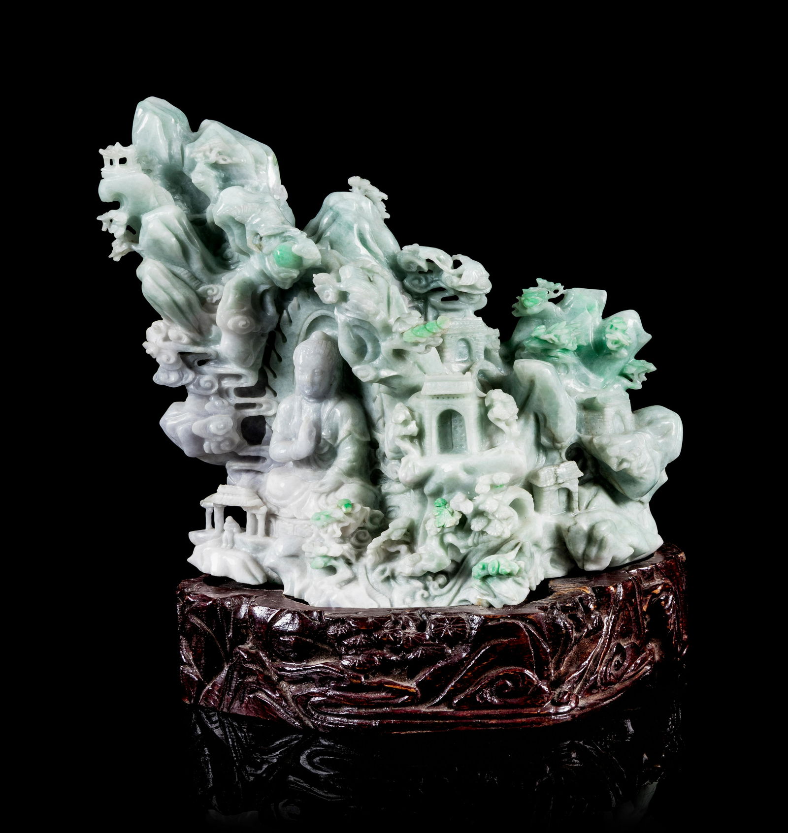 A Chinese Light Lavender and Celadon Jadeite Figural (1 of 3)