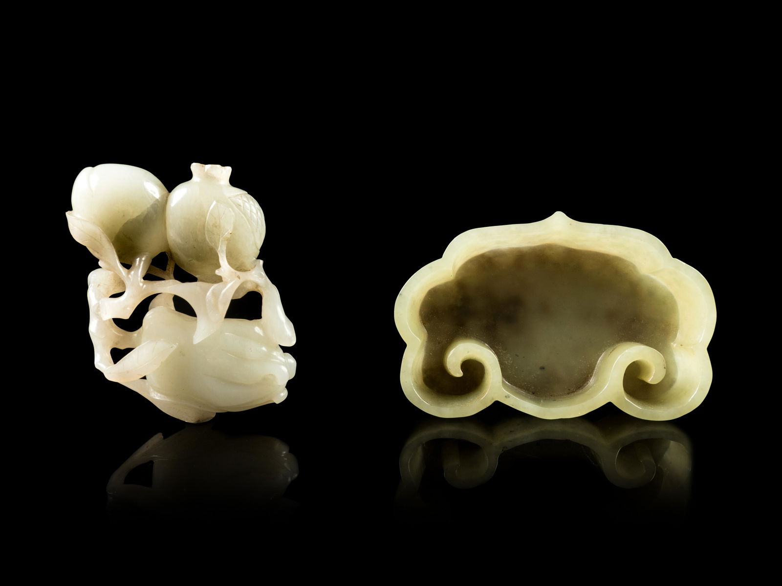 Two Chinese Celadon and Russet Jade Articles Length of (1 of 2)