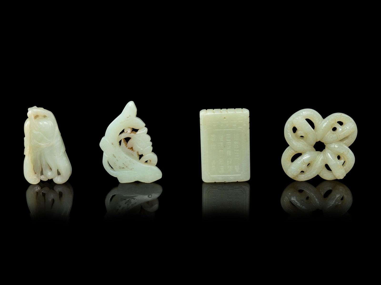 Four Chinese Pale Celadon Jade Pendants (1 of 2)