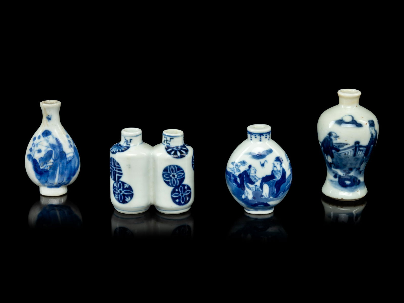 Four Chinese Blue and White Porcelain Snuff Bottles (1 of 4)