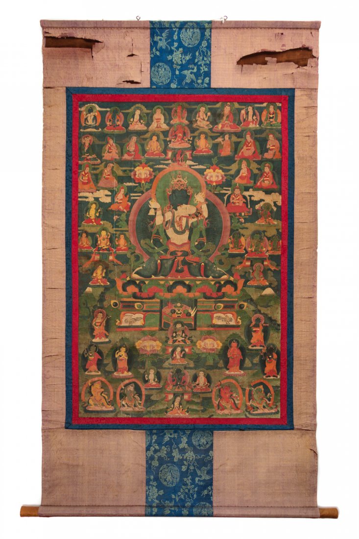 A Tibetan Thangka Image: 25 1/4 in. x 17 in., 64.1 x: A Tibetan Thangka depicted Kalachakra and Vishvamata Tempera to the center, surrounded by a group of deities. Image: 25 1/4 in. x 17 in., 64.1 x 43.2 cm. Property from the Collection of Gates Ripley, 