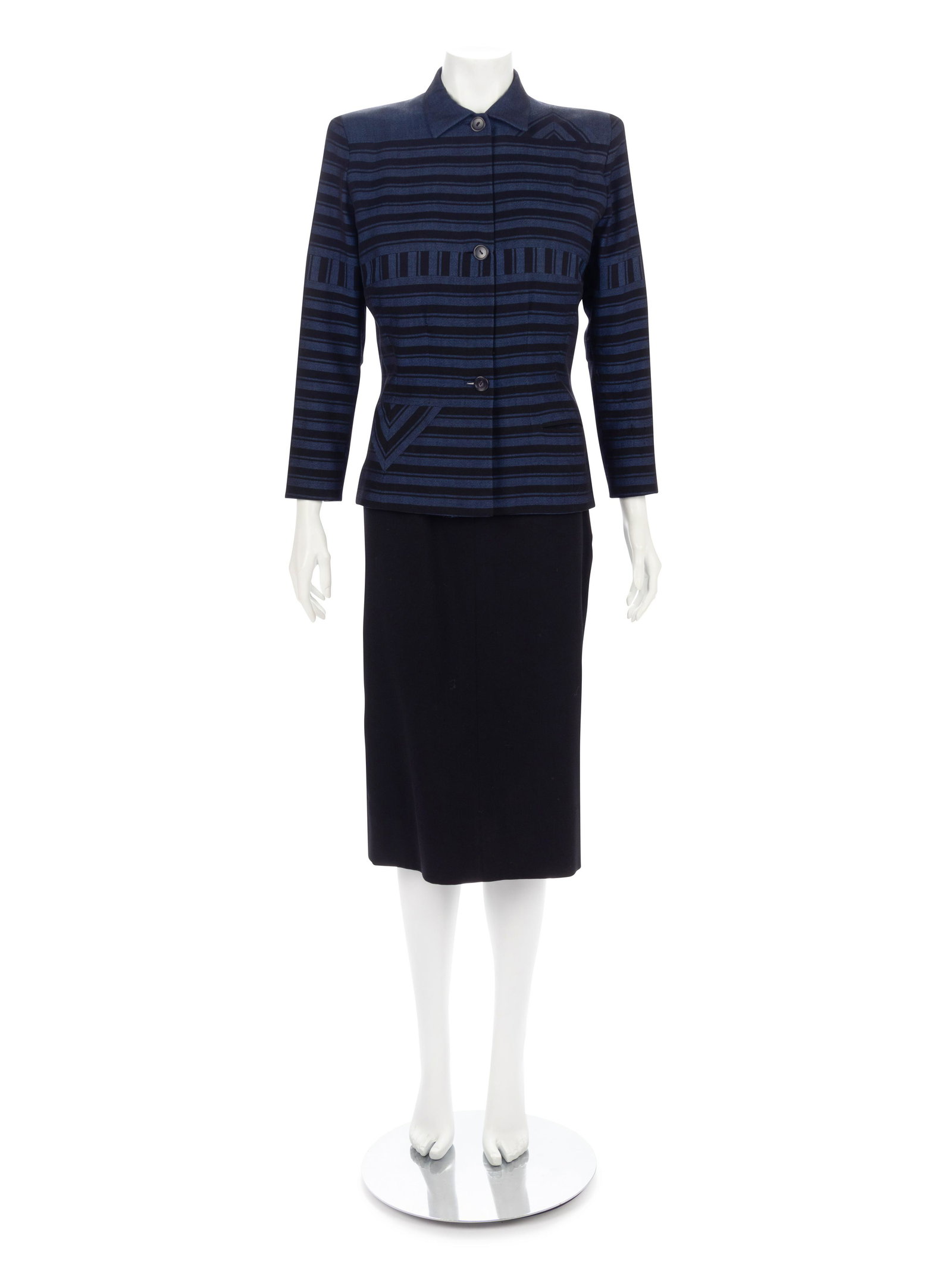 Adrian Skirt Suit, 1940s: Adrian Skirt Suit, 1940s Dark blue and black striped wool serge suit jacket with roll collar; paired with black serge straight fit skirt. The jacket has precision pattern and sewing details on the lef