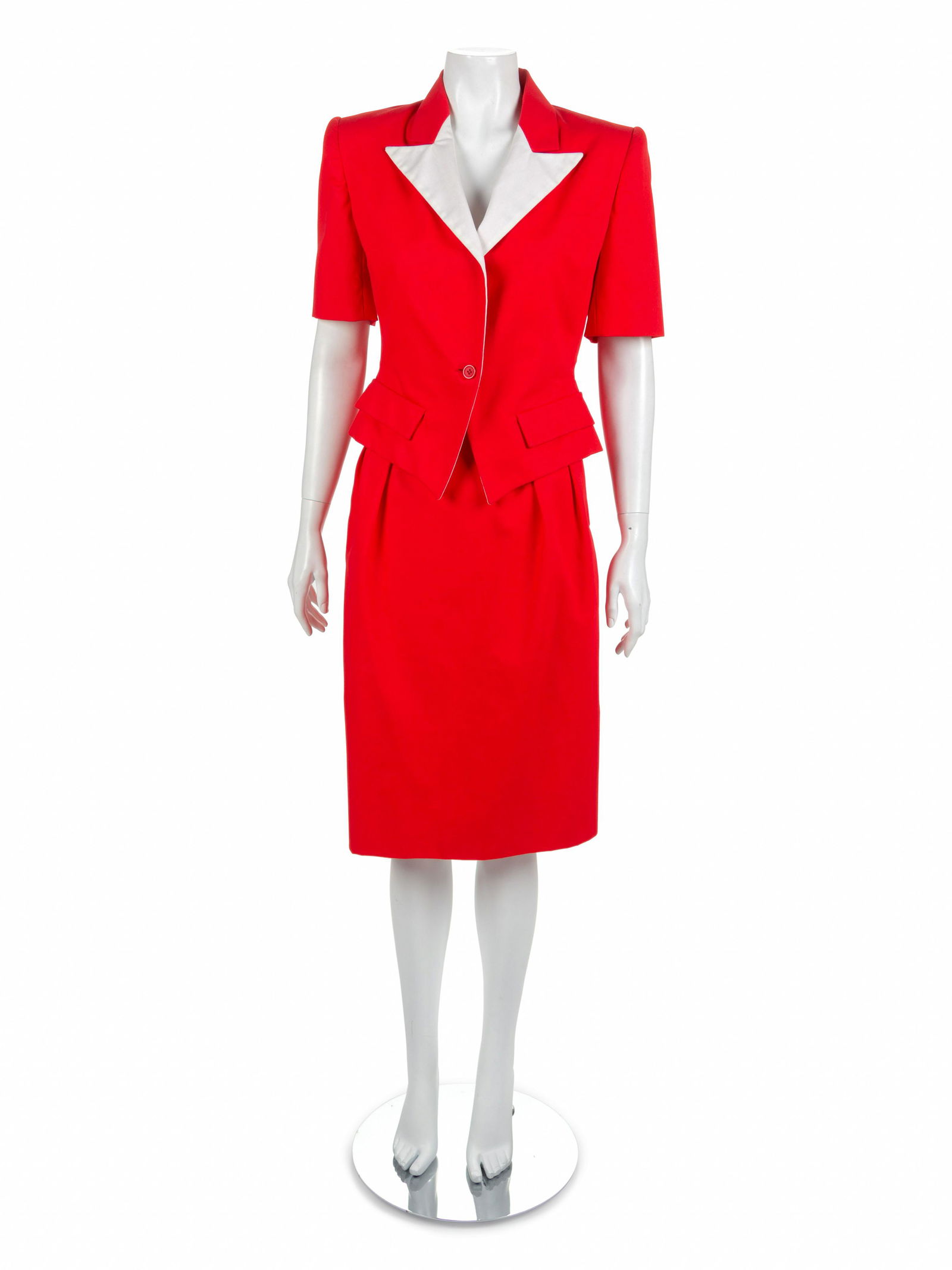 Four Bill Blass Ensembles, 1980s: Four Bill Blass Ensembles, 1980s This lot includes four ensembles. THE FIRST Red, green and white plaid top and pants. The top is made with a fold down collar, long sleeves gathered into a cuff