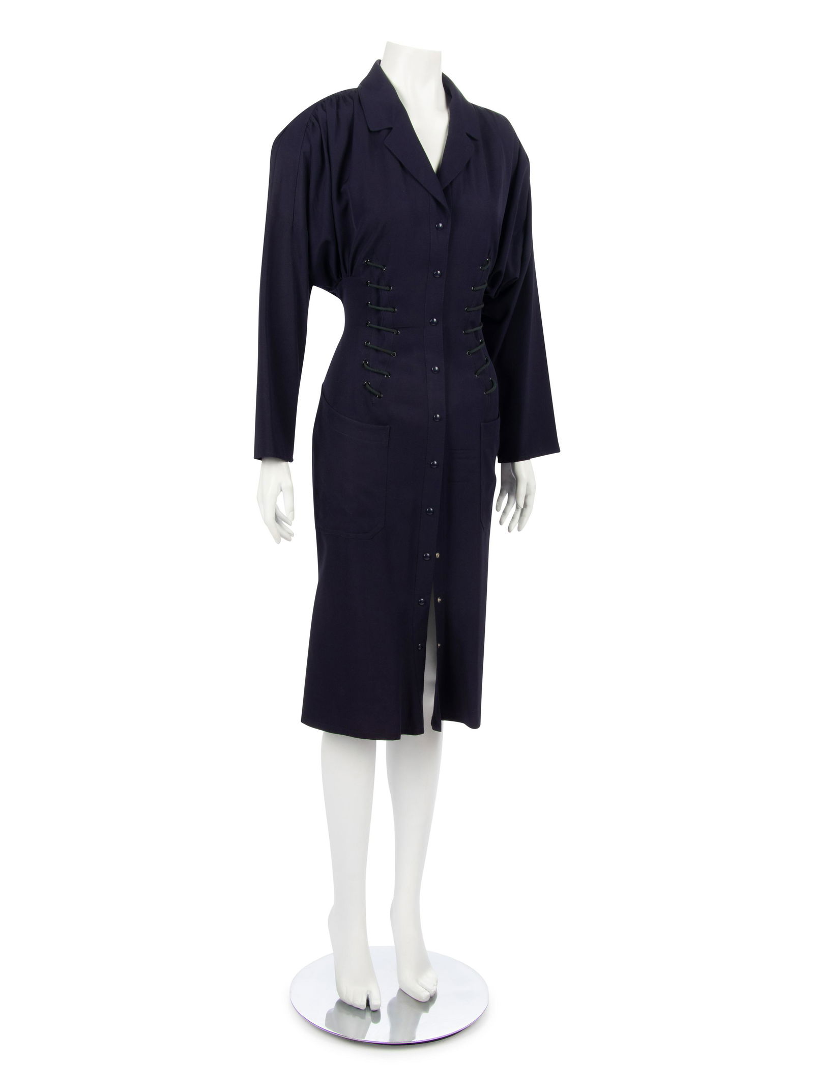 Two Thierry Mugler Dresses; One Blue with Rope Detail: Two Thierry Mugler Dresses; One Blue with Rope Detail Dress, One Black Polka Dot Dress, 1980-90s This lot includes two dresses. THE FIRST Dark blue suiting dress with ruched dolman sleeves, cent