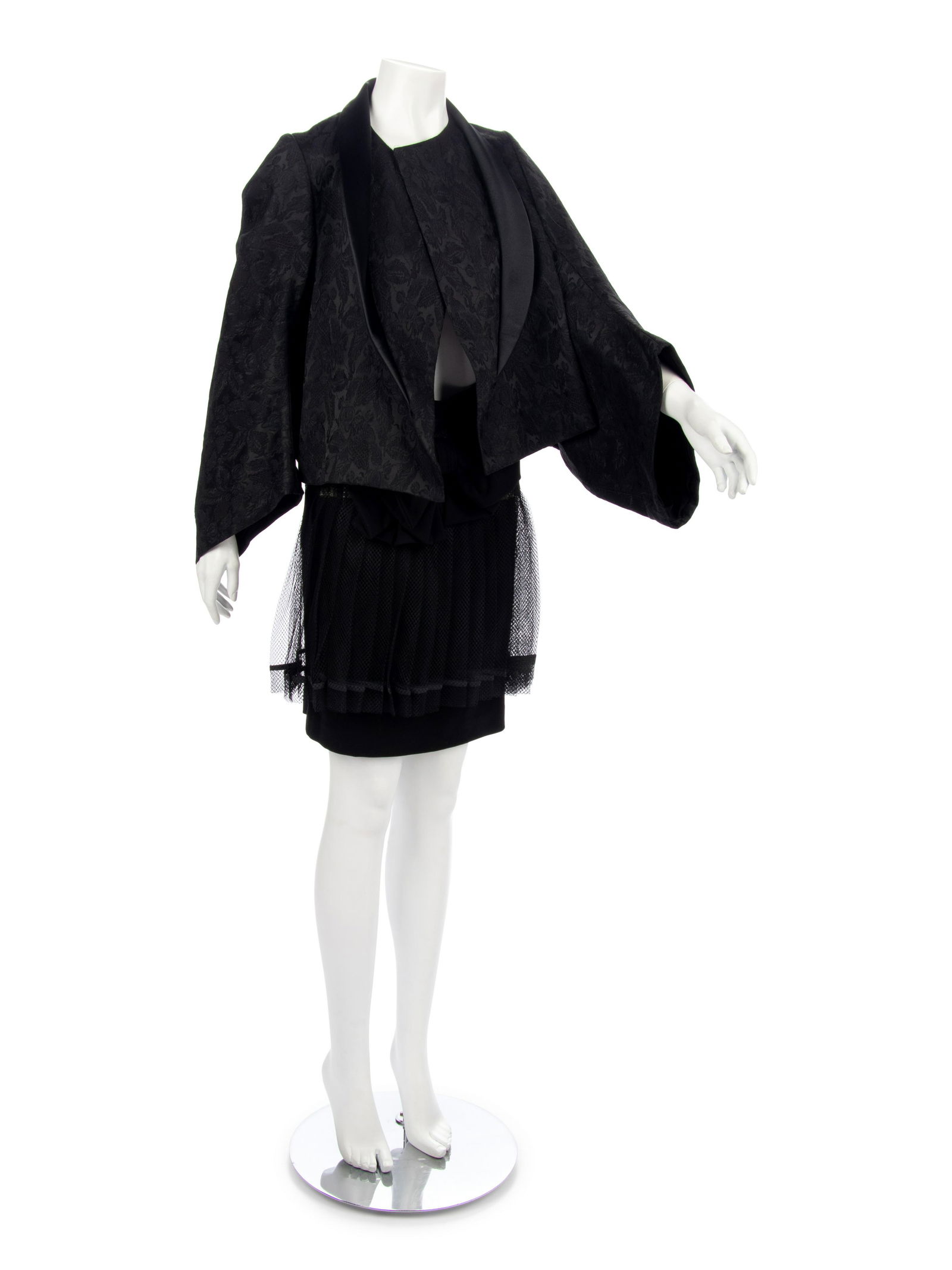 Comme des Garcons Skirt Suit, F/W 2004 : Comme des Garcons Skirt Suit, F/W 2004 Black acetate/polyester blend jacquard clutch jacket with kimono sleeves and satin shawl collar; paired with black wool skirt with pleated polyester net