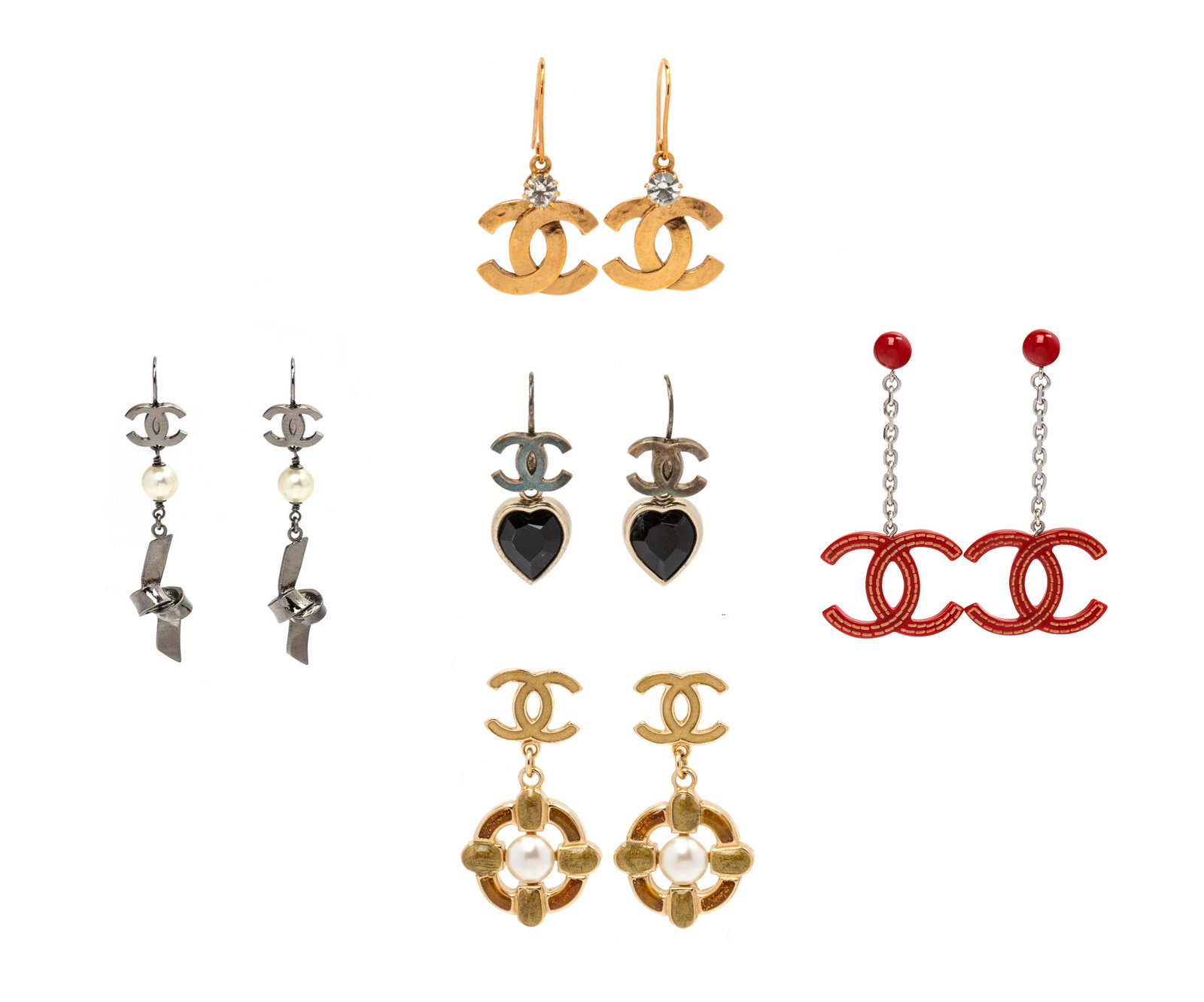 Five Pairs of Chanel Earrings, 2005 : Five Pairs of Chanel Earrings, 2005 This lot includes five pairs of earrings. THE FIRST Double C red plastic dangle earrings on silvertone chain. Label: Stamped Chanel 05 A, Autumn 2005 A