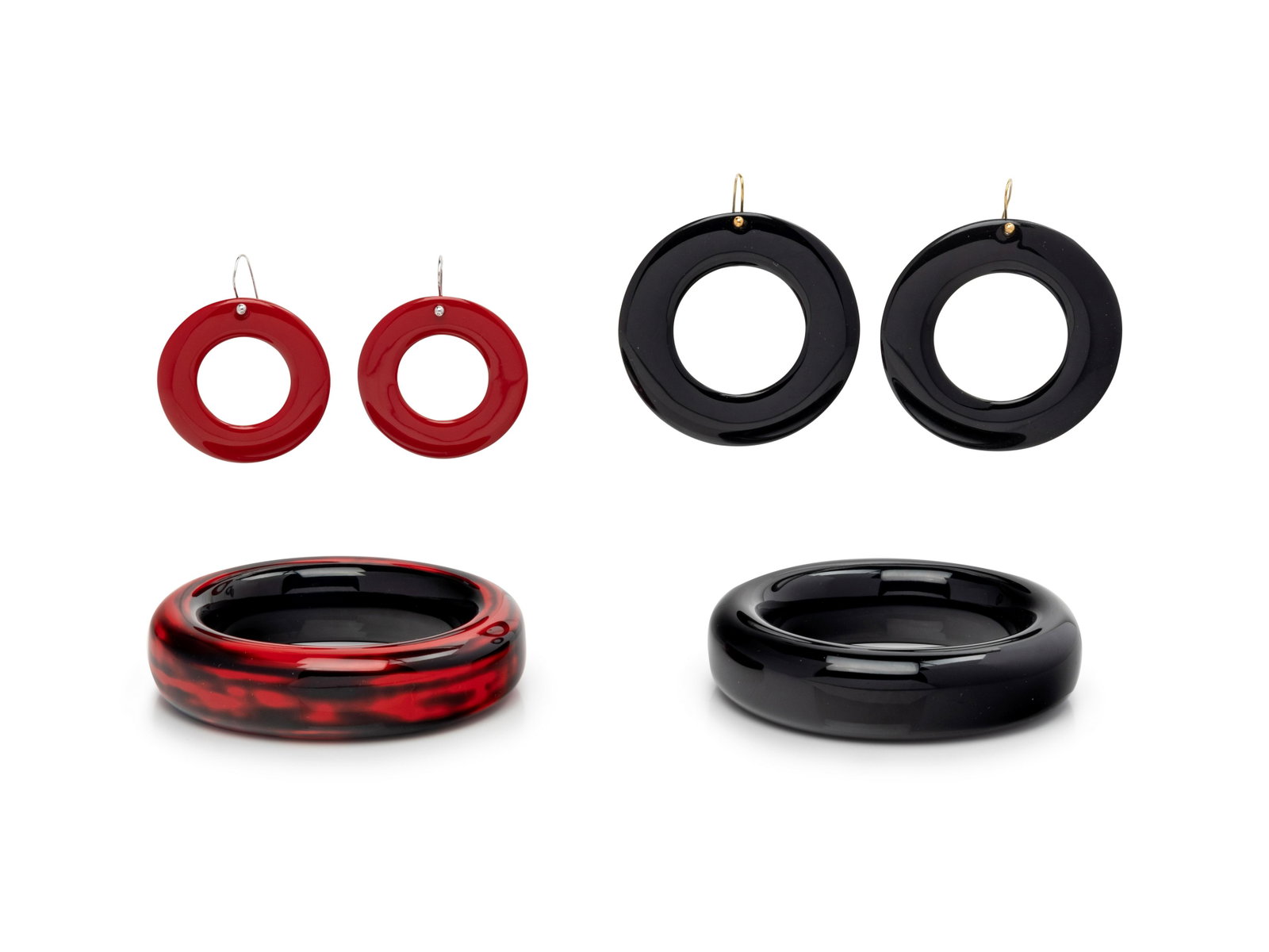 Collection of Elsa Peretti Tiffany Japanese Hardwood: Collection of Elsa Peretti Tiffany Japanese Hardwood and Lacquer Accessories, 1990s-2000s This lot includes two bangles and two pairs of earrings of Tiffany Japanese Hardwood and Lacquer. THE FI