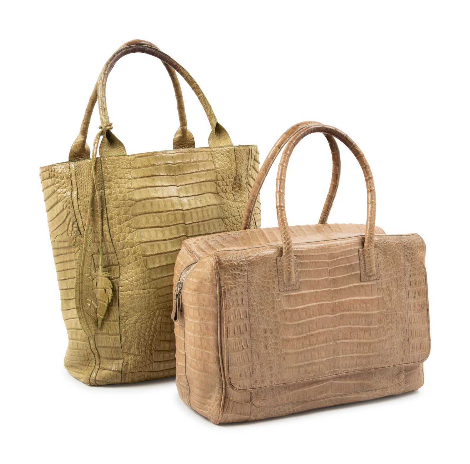 Two Nancy Gonzalez Crocodile Bags, 1990-2000s: Two Nancy Gonzalez Crocodile Bags, 1990-2000s THE FIRST A green crocodile tote lined in green seude with a decoration on handle of green alligator cut into the shape of feathers. Label: Nancy Go