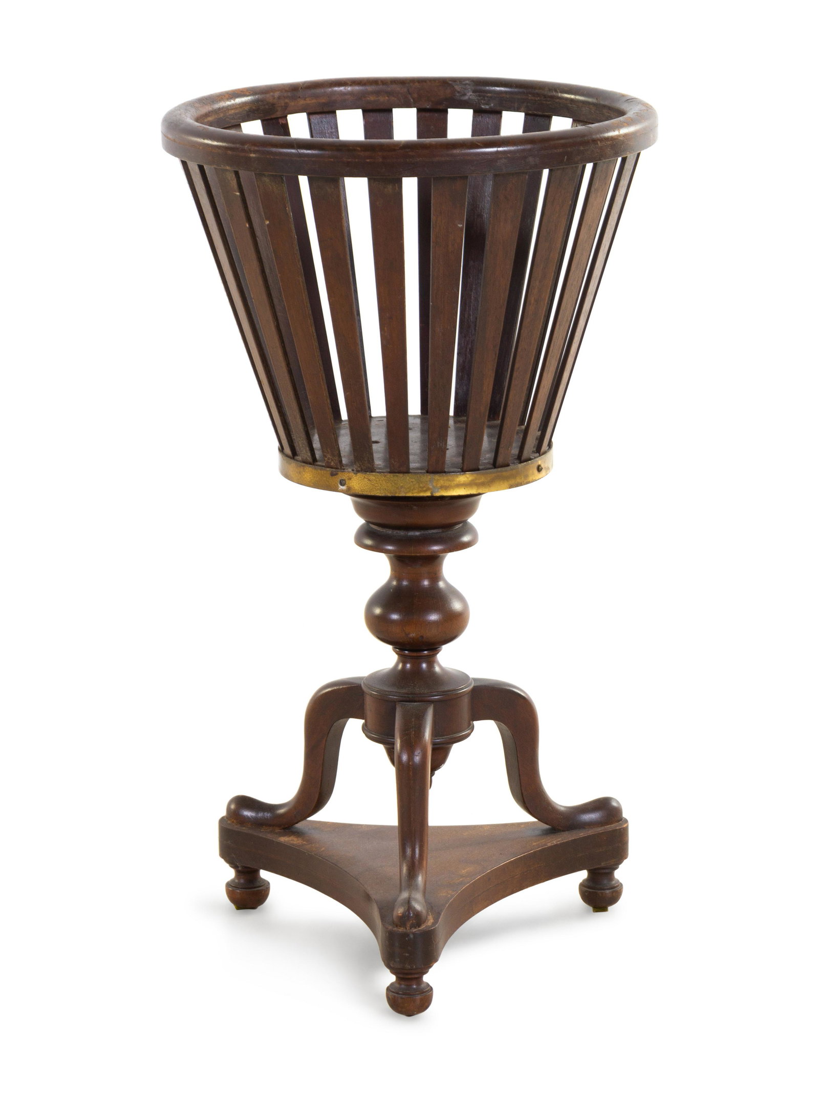 A Regency Style Brass Banded Mahogany Jardiniere: A Regency Style Brass Banded Mahogany Jardiniere First Half 20th Century Height 23 3/4 inches. Property from the Estate of Dorothy Manewal Stephens, St. Louis, Missouri