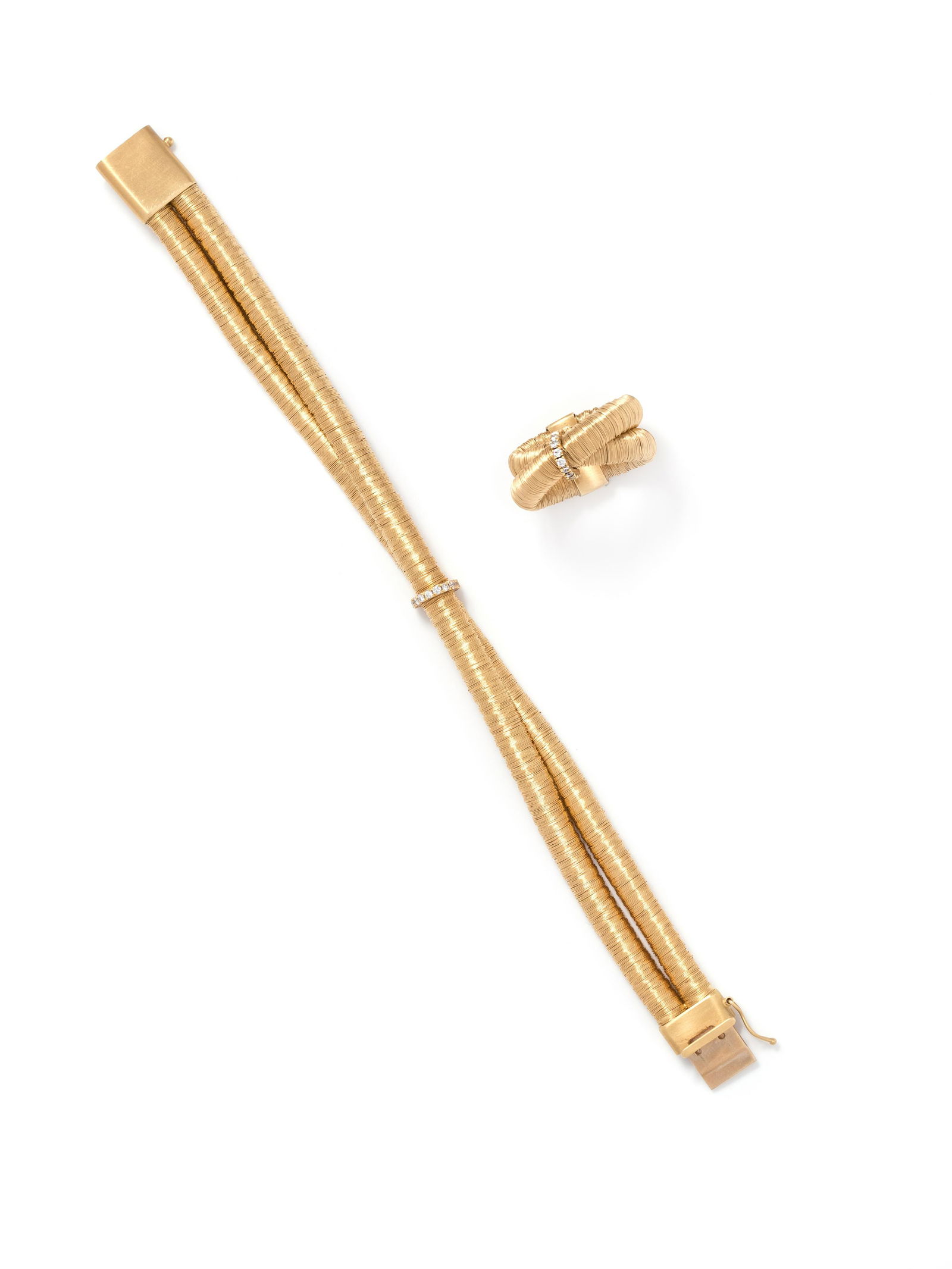 YVEL, YELLOW GOLD AND DIAMOND SET: YVEL, YELLOW GOLD AND DIAMOND SET Consisting of a bracelet containing two rows of mesh link bracelets and a center section containing 10 round brilliant cut diamonds, together with a matching ring con