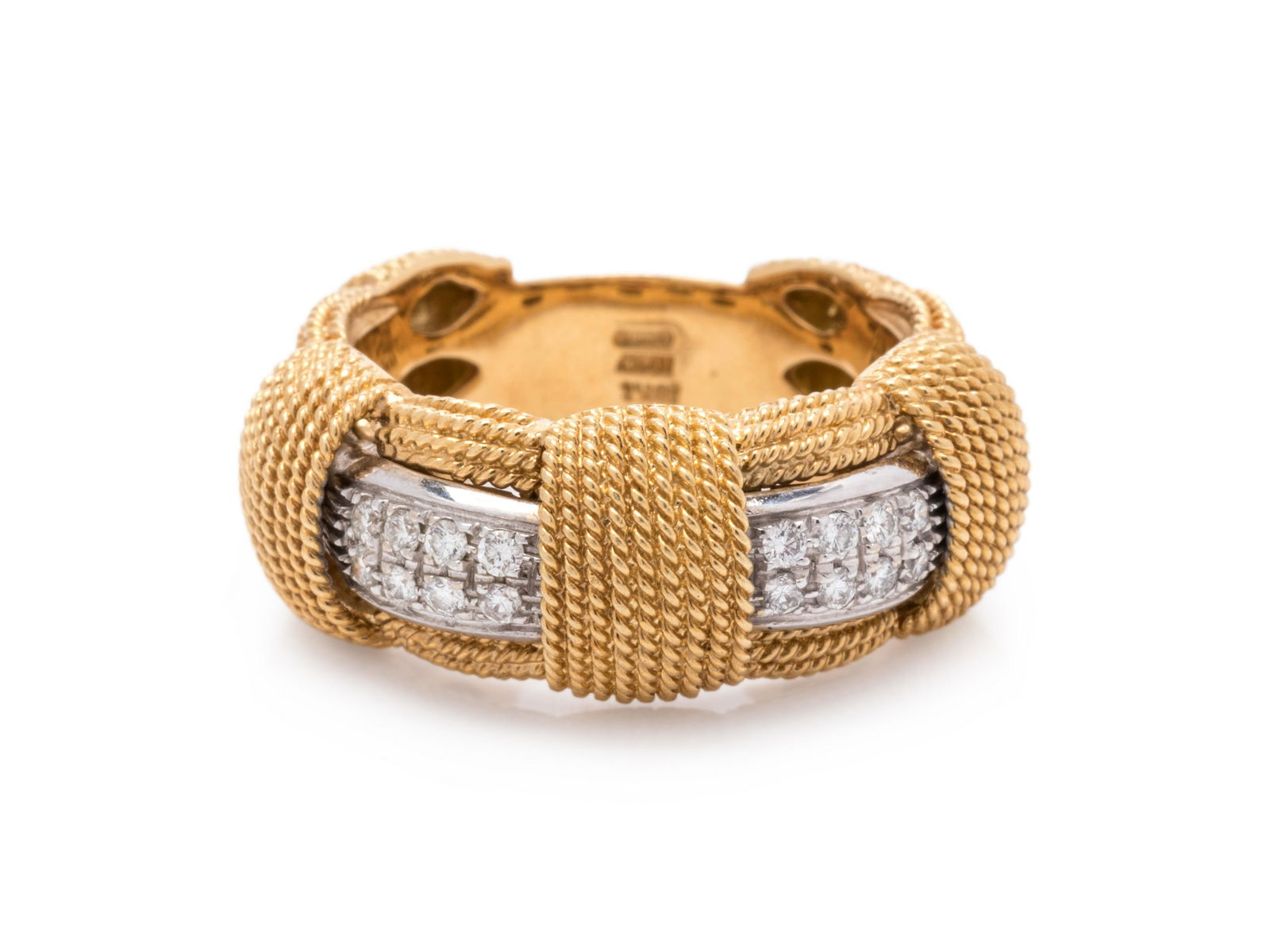 ROBERTO COIN, BICOLOR GOLD AND DIAMOND 'APPASSIONATA': ROBERTO COIN, BICOLOR GOLD AND DIAMOND 'APPASSIONATA' RING Containing 32 round brilliant cut diamonds weighing approximately 0.25 carat total. Stamp: 18Kt ITALY (Roberto Coin Italian hallmark). 7.65 d
