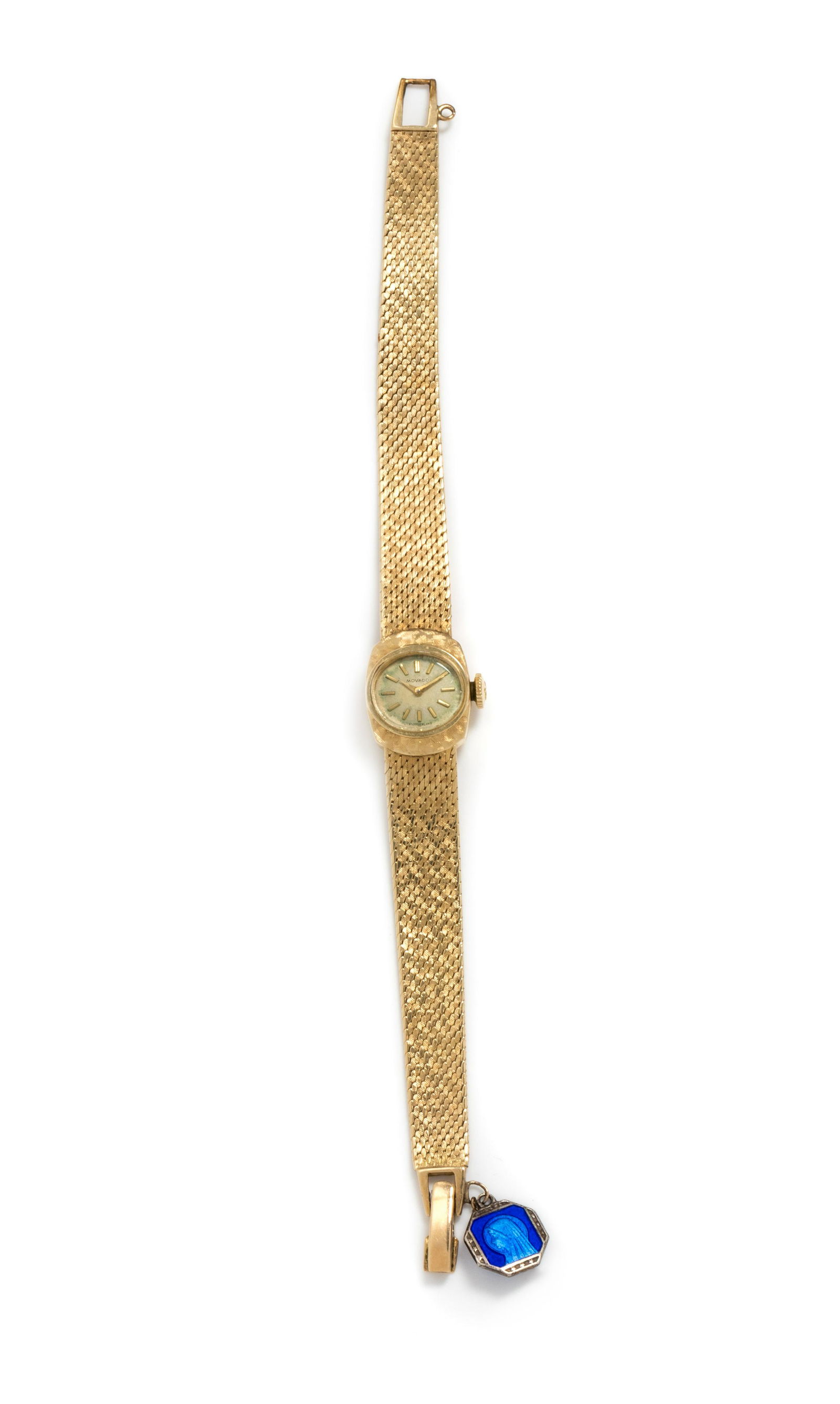 MOVADO, 14K YELLOW GOLD WRISTWATCH: MOVADO, 14K YELLOW GOLD WRISTWATCH 17.00 x 14.00 mm case dimensions, matte silvered dial, applied gold baton numerals, manual wind 17 jewel movement signed MOVADO, textured mesh link bracelet, fold ov