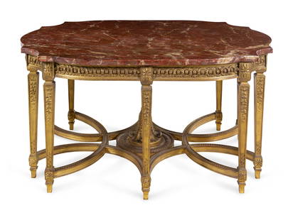 A Louis XVI Style Carved Giltwood Center Table: A Louis XVI Style Carved Giltwood Center Table Manner of Adam Weisweiler, 19th Century Height 30 3/4 x width 61 x depth 45 3/4 inches. Property from the Collection of Don and Carolyn Kirkpatrick, Litt