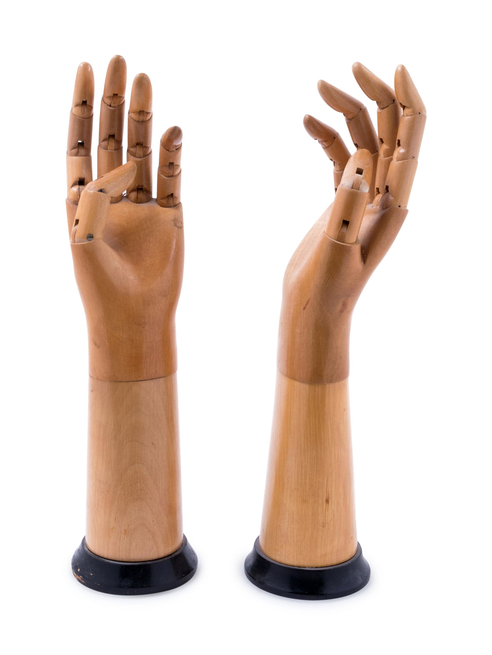 A Pair of French Carved and Articulated Wood Glove: A Pair of French Carved and Articulated Wood Glove Molds Height 12 1/2 inches. Property from a Private Collector, Chicago, Illinois