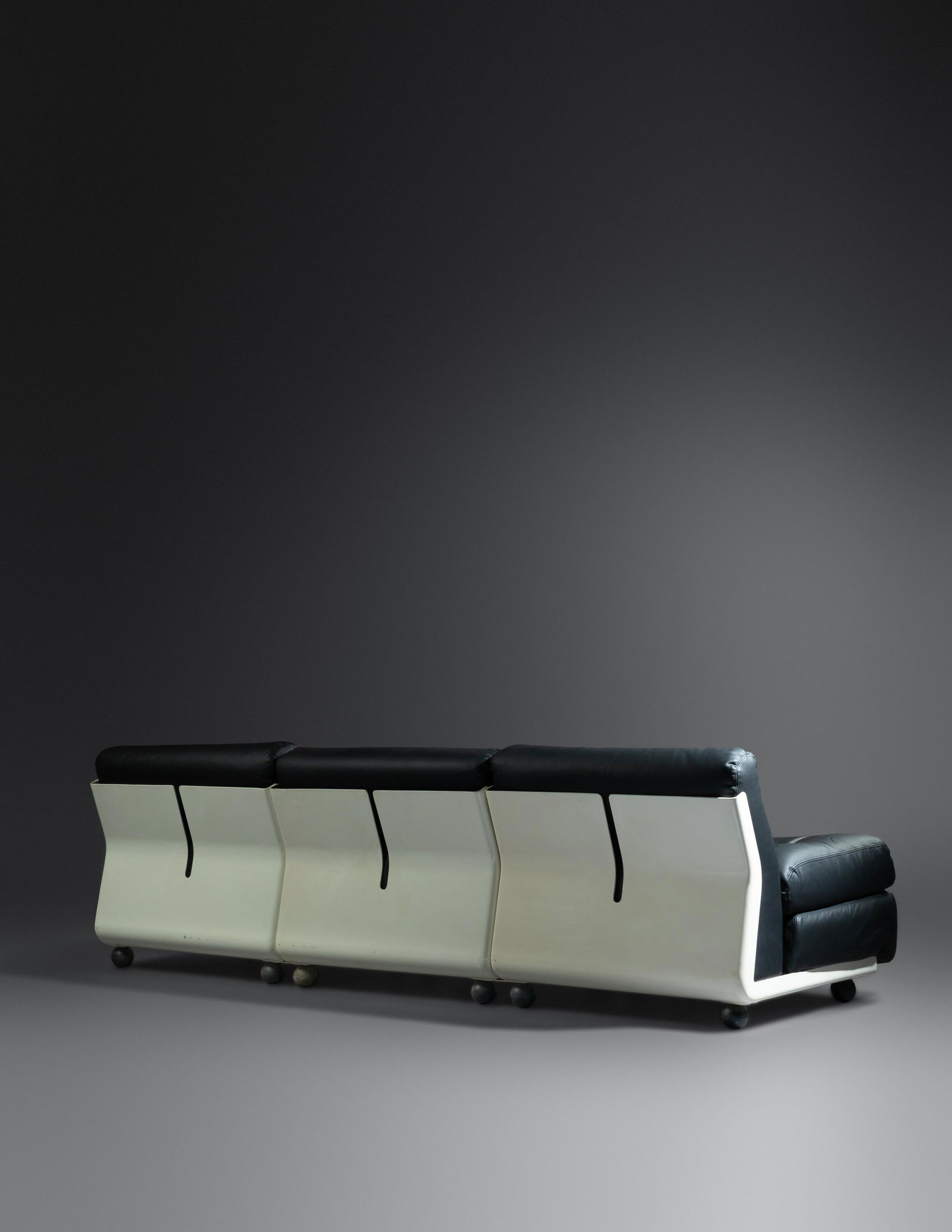 Mario Bellini (Italian, b. 1935) Amanta Sofa, C&B: Mario Bellini (Italian, b. 1935) Amanta Sofa, C&B Italia, Italy leather, plastic, rubber manufacturer's labels to underside of cushions with impressed markings to underside of plastic shell portion. 2