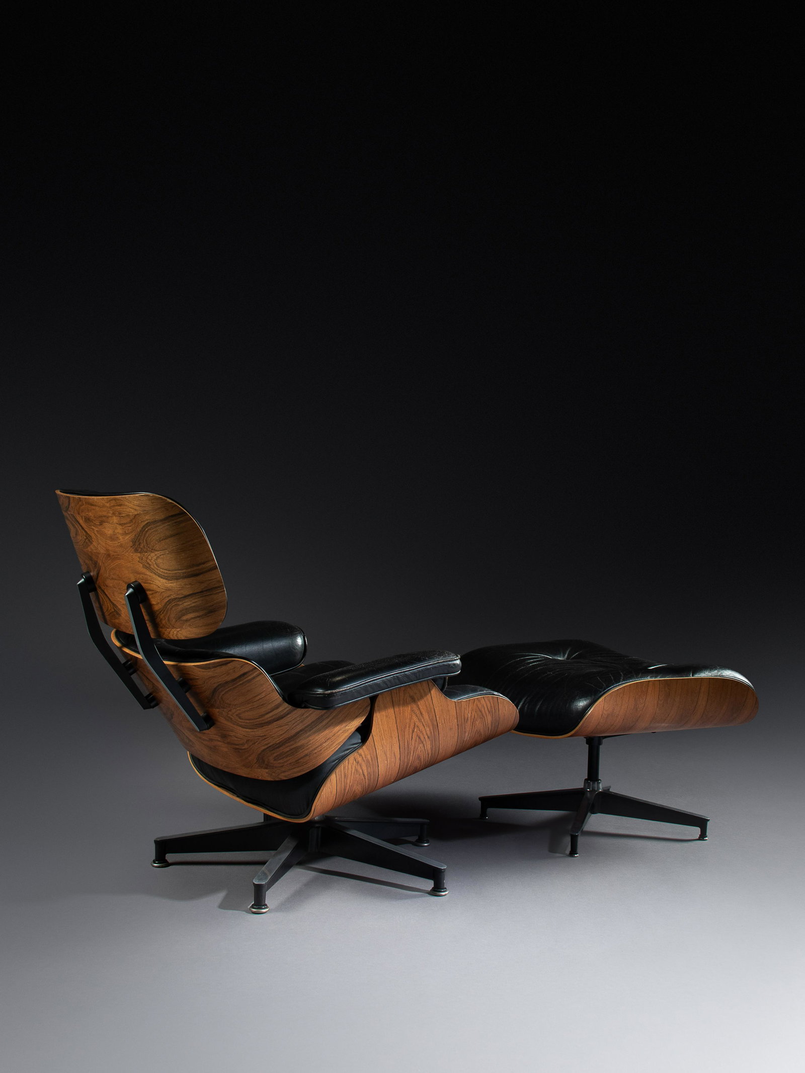 Charles and Ray Eames (American, 1907-1978 | American,: Charles and Ray Eames (American, 1907-1978 | American, 1912-1988) Lounge Chair, model 670 and Ottoman, model 671, Herman Miller, USA rosewood plywood, leather, enameled aluminum manufacturer's labels 