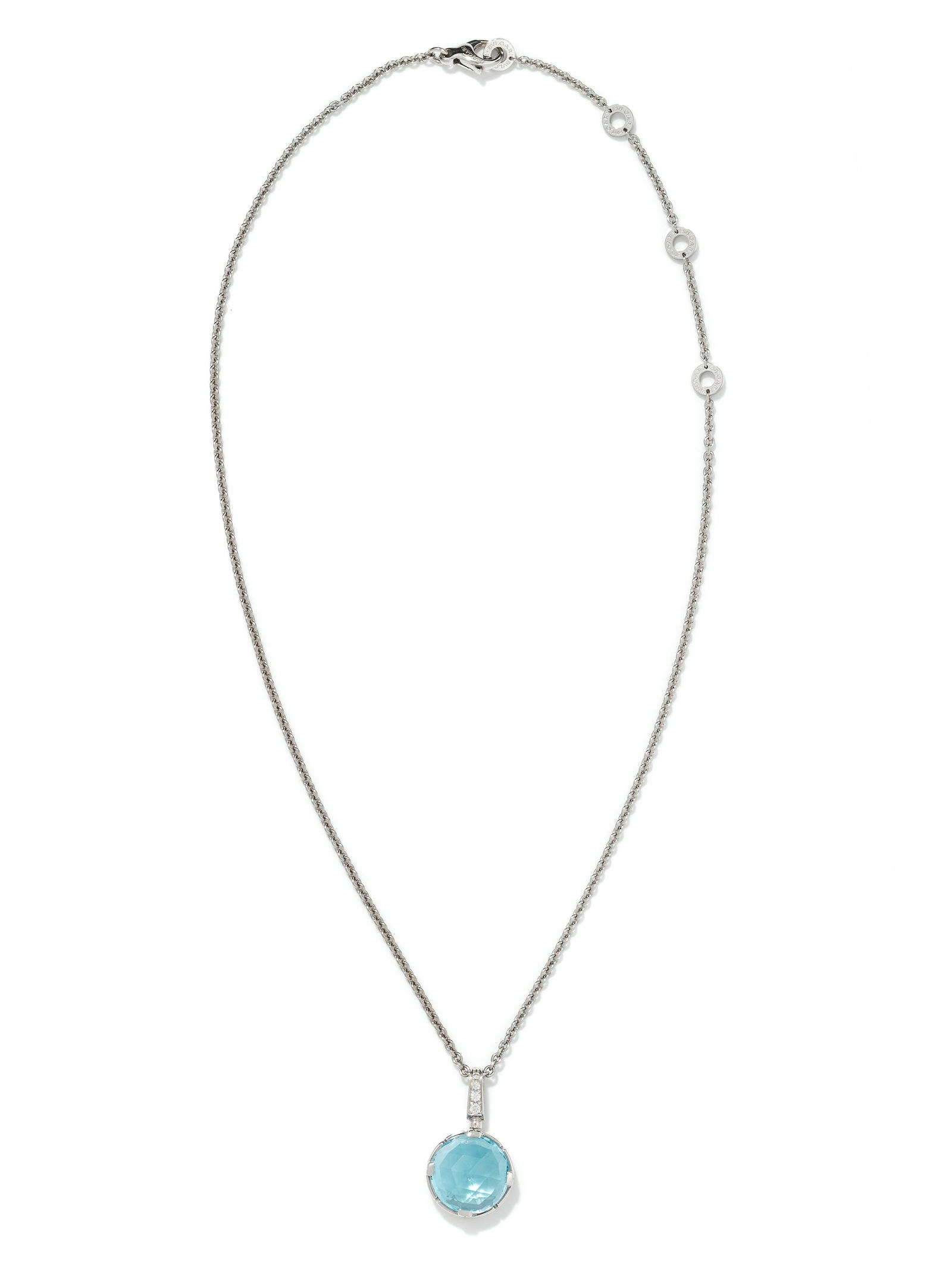 BVLGARI, WHITE GOLD, BLUE TOPAZ AND DIAMOND: BVLGARI, WHITE GOLD, BLUE TOPAZ AND DIAMOND 'PARENTESI' PENDANT/NECKLACE Consisting of a pendant signed BVLGARI containing one round rose cut blue topaz measuring approximately 15.00 mm in diameter an