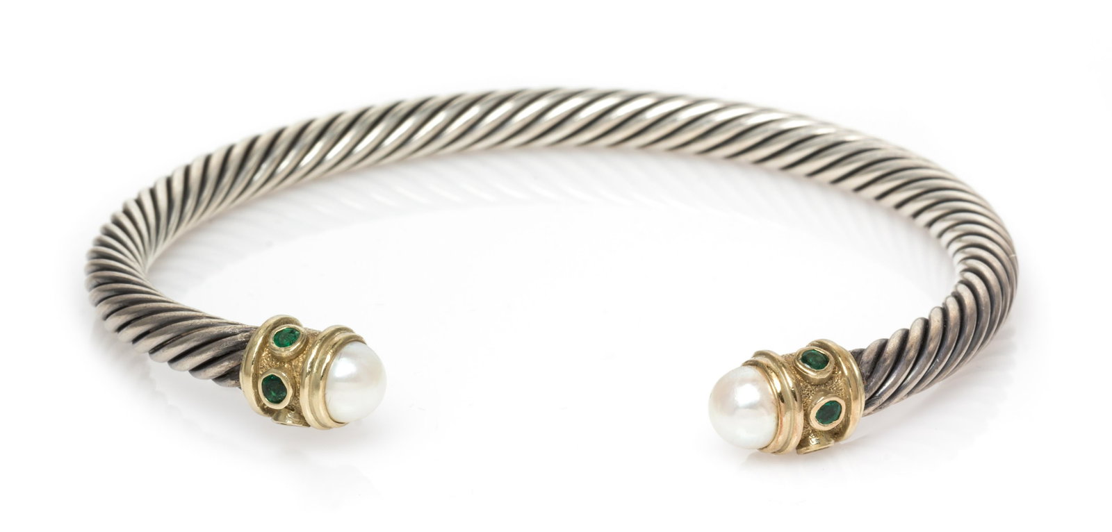 DAVID YURMAN, STERLING SILVER, YELLOW GOLD, CULTURED: DAVID YURMAN, STERLING SILVER, YELLOW GOLD, CULTURED PEARL AND GEMSTONE 'RENAISSANCE' CUFF BRACELET Consisting of a cable measuring approximately 5.00 mm wide, the gold finials containing two pearls a