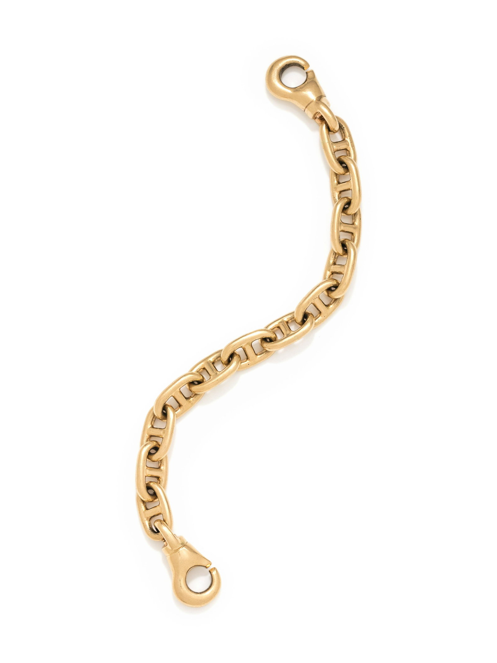 YELLOW GOLD BRACELET: YELLOW GOLD BRACELET Consisting of an anchor link chain measuring approximately 11.20 mm wide, with oversize double hook clasp. Stamp: (maker's mark) 14KT. 44.55 dwt.