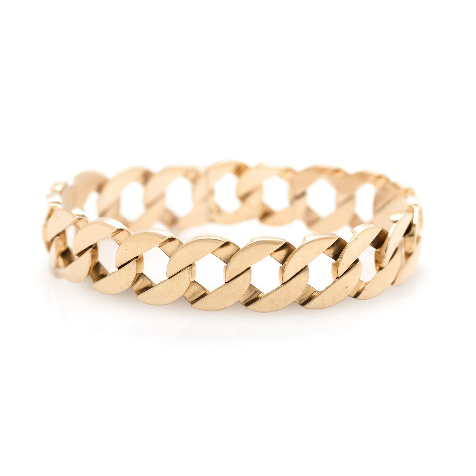 YELLOW GOLD BRACELET: YELLOW GOLD BRACELET Consisting of a flattened curb link chain measuring approximately 14.30 mm wide. Stamp: SUCCO 14K. 28.05 dwt.