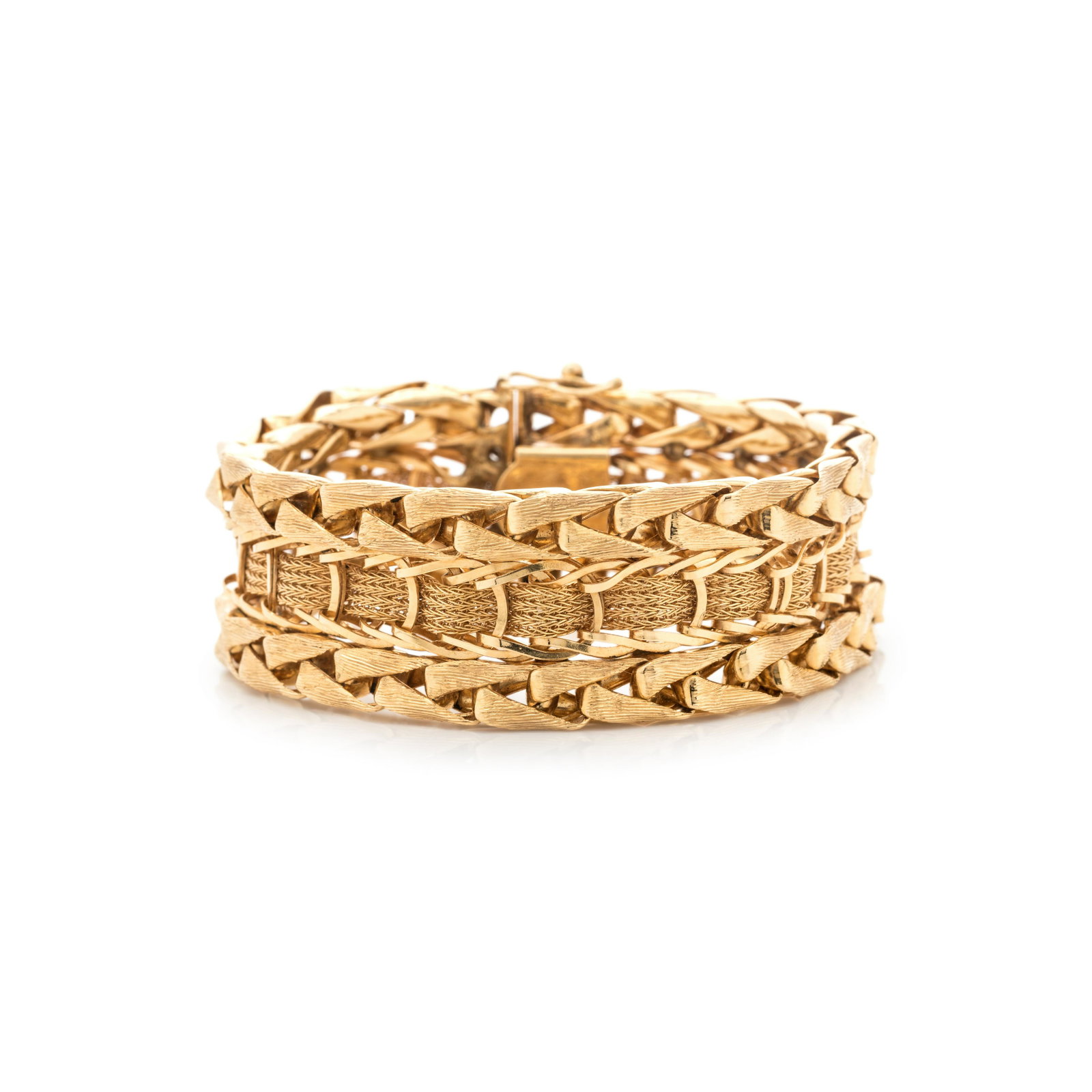 YELLOW GOLD BRACELET: YELLOW GOLD BRACELET Consisting of interlocking fancy link chains measuring approximately 22.00 mm wide. Stamp: 14K. 30.85 dwt.