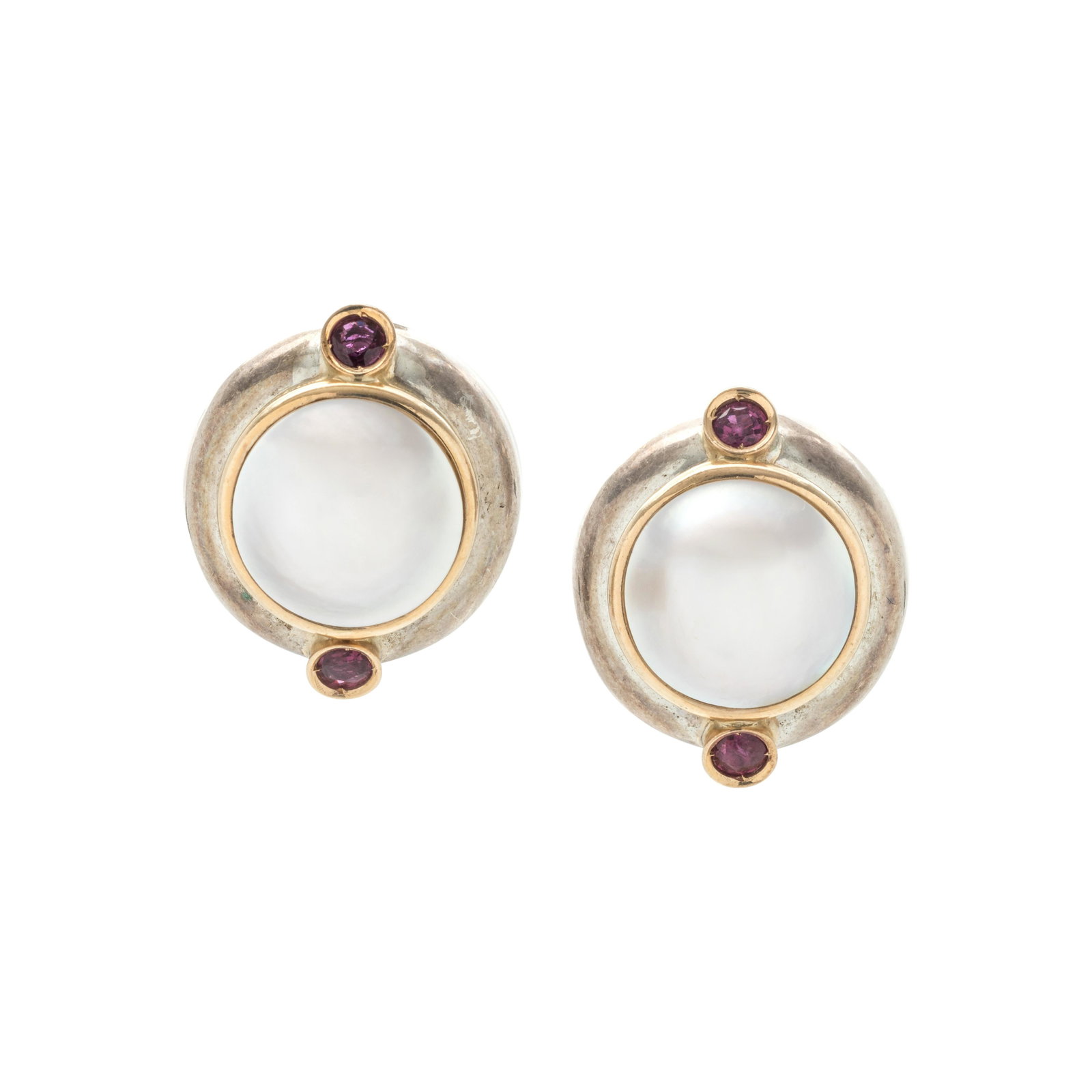 STERLING SILVER, YELLOW GOLD, CULTURED MABE PEARL AND: STERLING SILVER, YELLOW GOLD, CULTURED MABE PEARL AND RUBY EARCLIPS Containing two mabe pearls measuring approximately 13.70 mm in diameter and four round mixed cut rubies measuring approximately 3.40