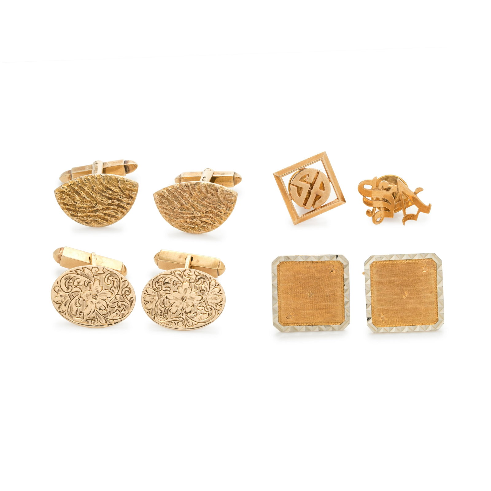 COLLECTION OF YELLOW GOLD MEN'S ACCESSORIES: COLLECTION OF YELLOW GOLD MEN'S ACCESSORIES Consisting of a pair of 9 karat textured gold cufflinks, a pair of 18 karat bicolor gold cufflinks, a pair of 14 karat oval floral engraved cufflinks, toget