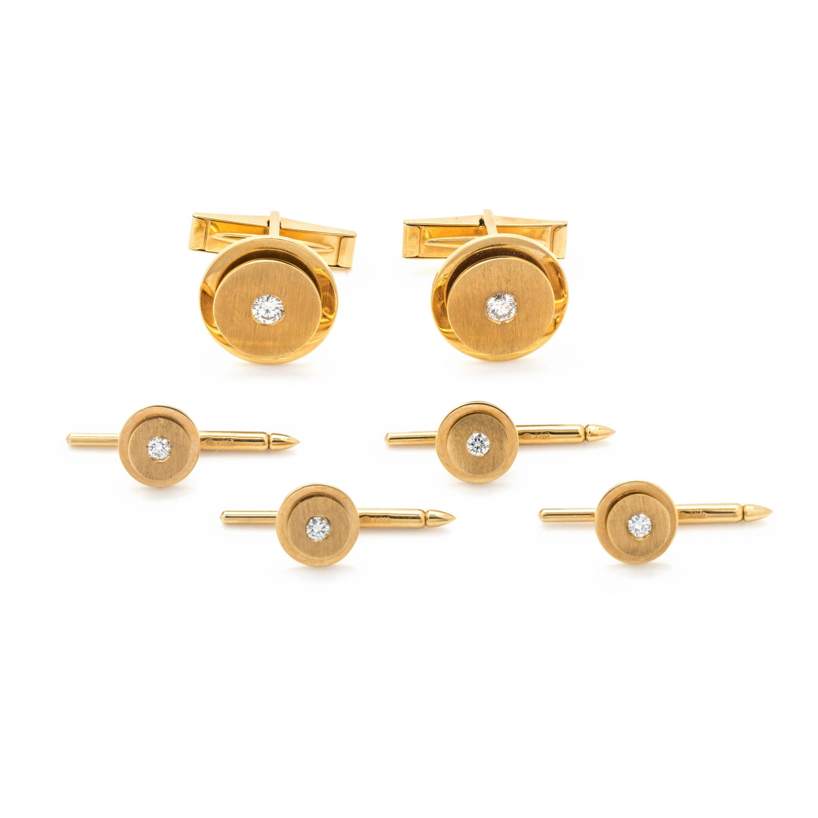 YELLOW GOLD AND DIAMOND DRESS SET: YELLOW GOLD AND DIAMOND DRESS SET Consisting of a pair of cufflinks and three shirt studs containing six round brilliant cut diamonds weighing approximately 0.70 carat total. Stamp: 18K LINDSAY. 16.35