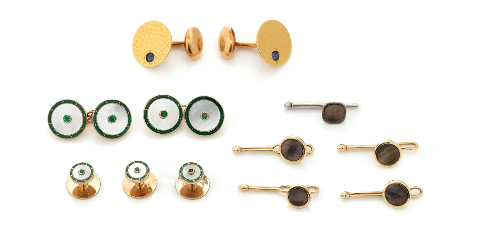 COLLECTION OF MEN'S ACCESSORIES: COLLECTION OF MEN'S ACCESSORIES Consisting of a pair of yellow gold hammered cufflinks containing two round mixed cut sapphires measuring approximately 3.20 mm in diameter, a 9 karat gold British dres