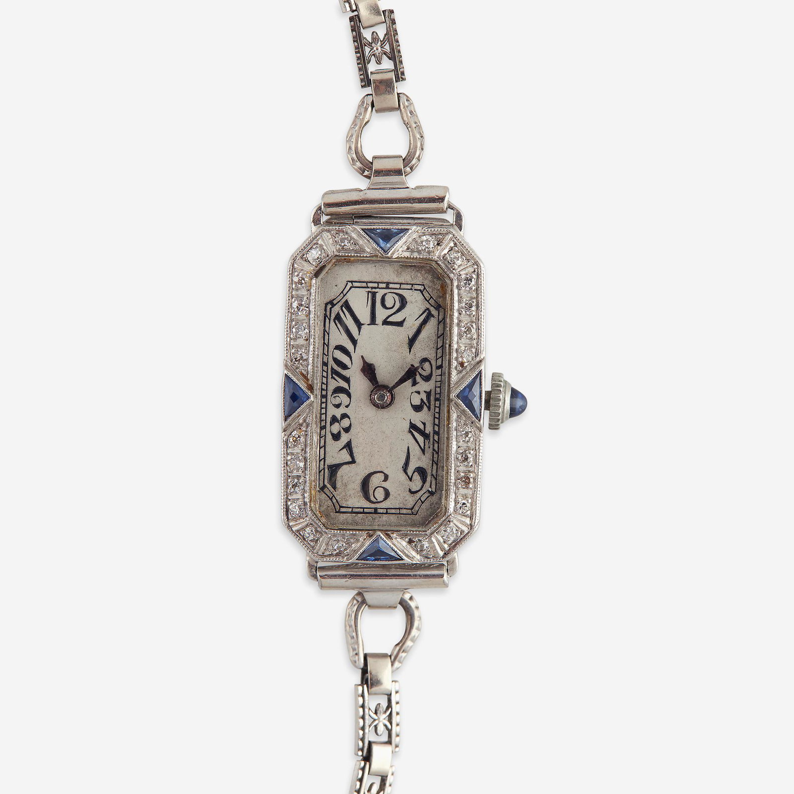 A collection of three fourteen karat white gold,: A collection of three fourteen karat white gold, platinum, and diamond wristwatches, Girard Perregaux, Hamilton, and Swiss circa 1910's to 1930's jeweled movements, set with single-cut diamonds and sy