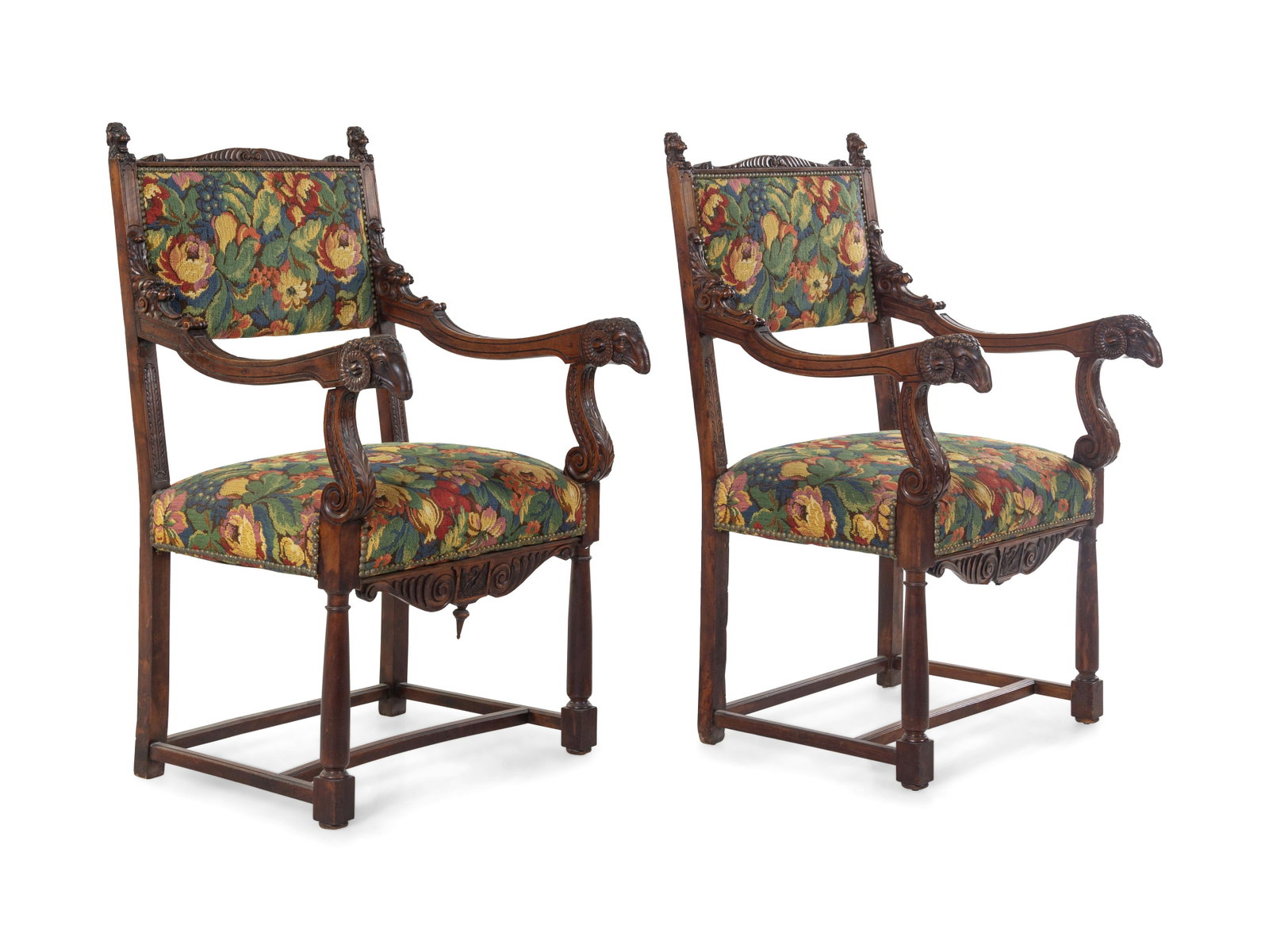 A Pair of Empire Style Carved Walnut Fauteuils: A Pair of Empire Style Carved Walnut Fauteuils 20th Century each with needlepoint upholstery. Height 40 inches. Property from the Collection of Dr. Gregory Boshart and Dr. William Lawrence, Chicago, I