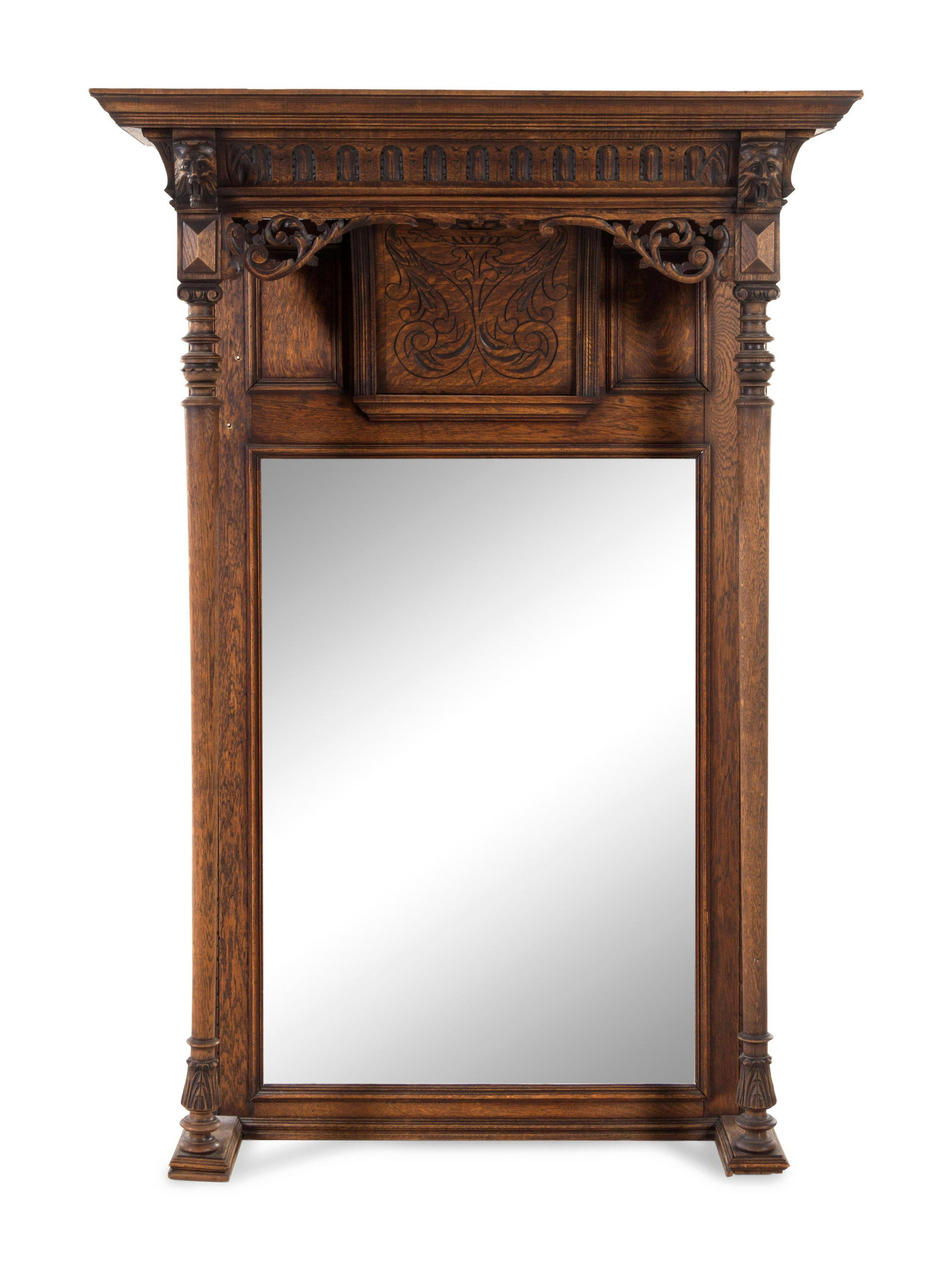 A Renaissance Revival Carved Oak Overmantel Mirror: A Renaissance Revival Carved Oak Overmantel Mirror Late 19th Century Height 64 x width 44 x depth 13 inches.