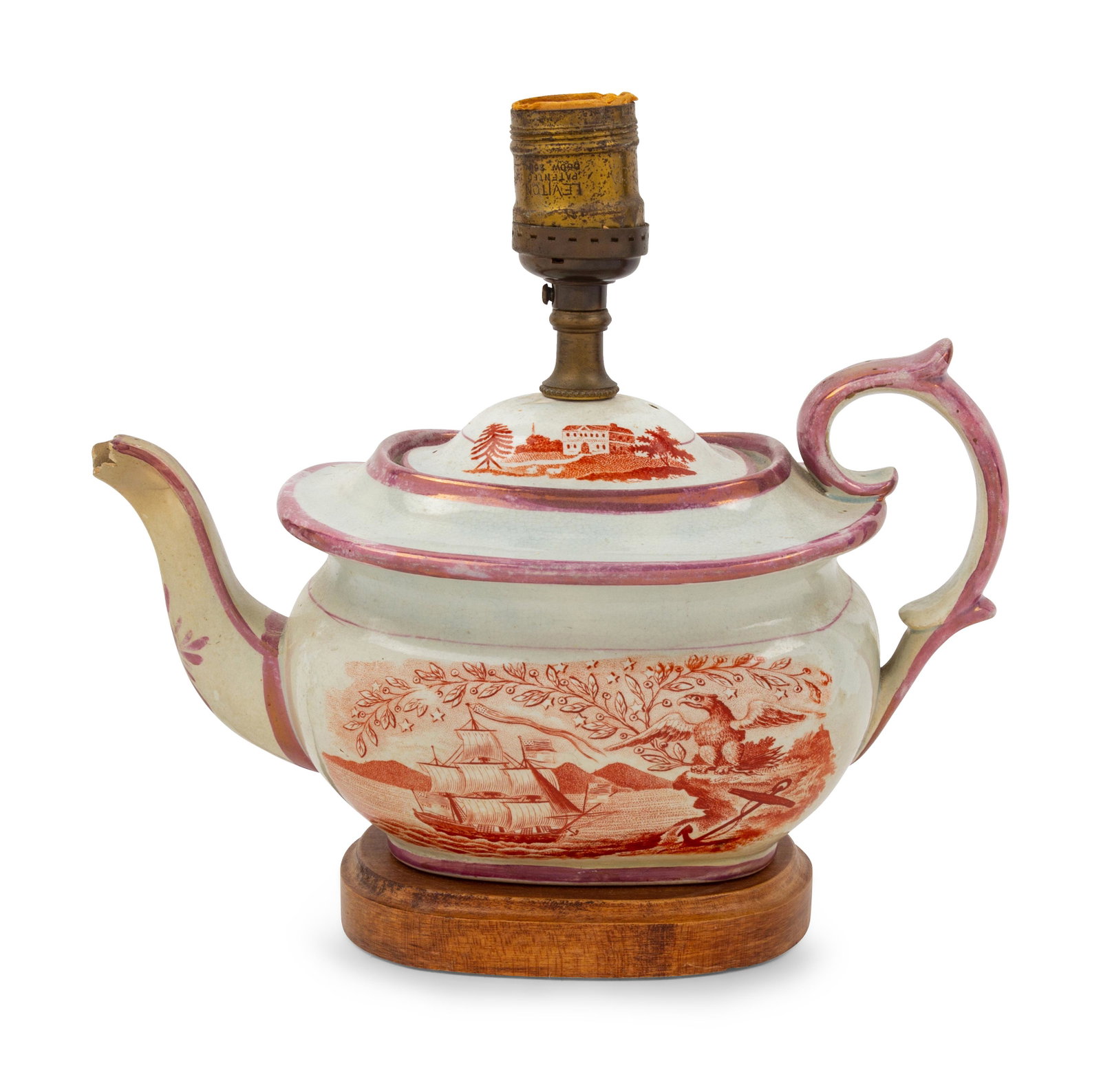 An English Lusterware Decorated Teapot: An English Lusterware Decorated Teapot mounted as a lamp. Width 9 3/4 inches. Property from the Collection of Michael and Janice Doniger, Chicago, Illinois