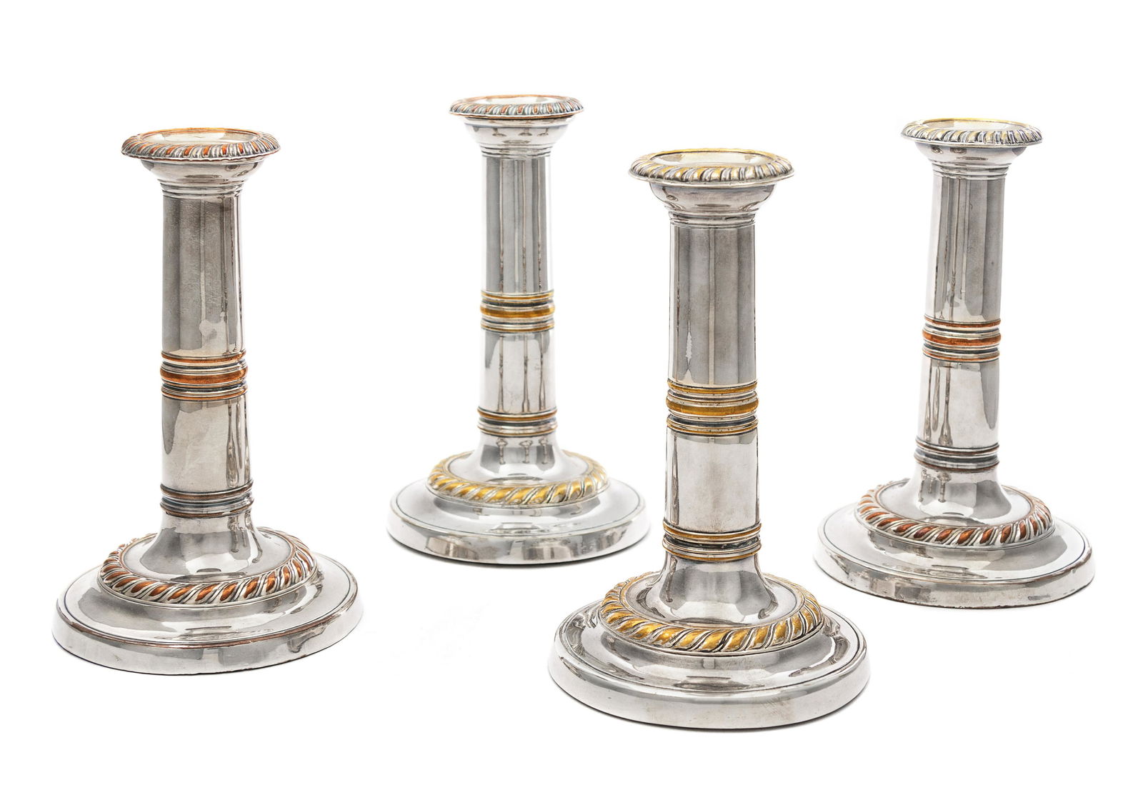 A Set of Four Regency Silver-Plate Candlesticks (1 of 2)