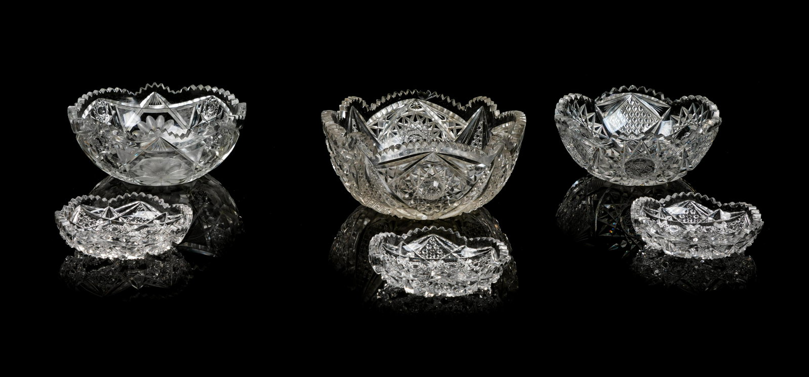 Three English Cut Glass Bowls: Three English Cut Glass Bowls of various size and patterns, together with three smaller bowls. Diameter of largest 9 inches. Property from the Collection of Michael and Janice Doniger, Chicago, Illino