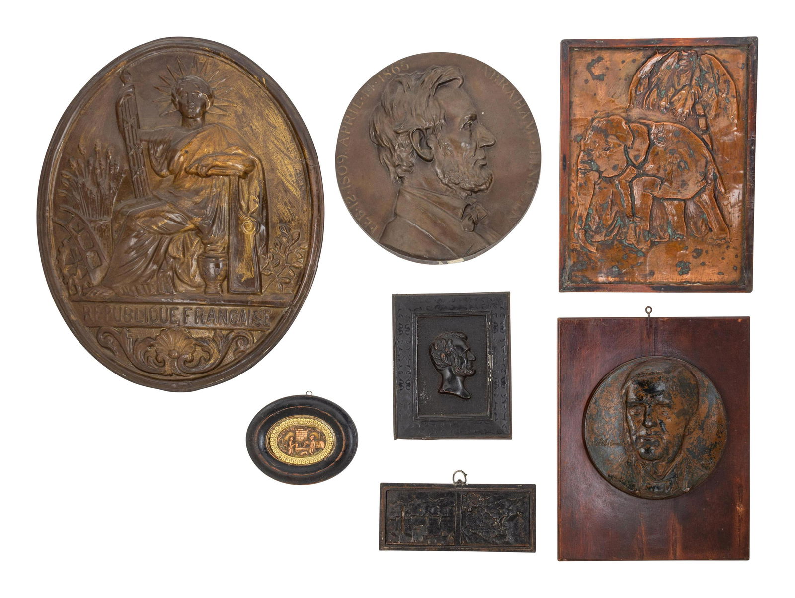 Seven Metal Relief Plaques (1 of 1)