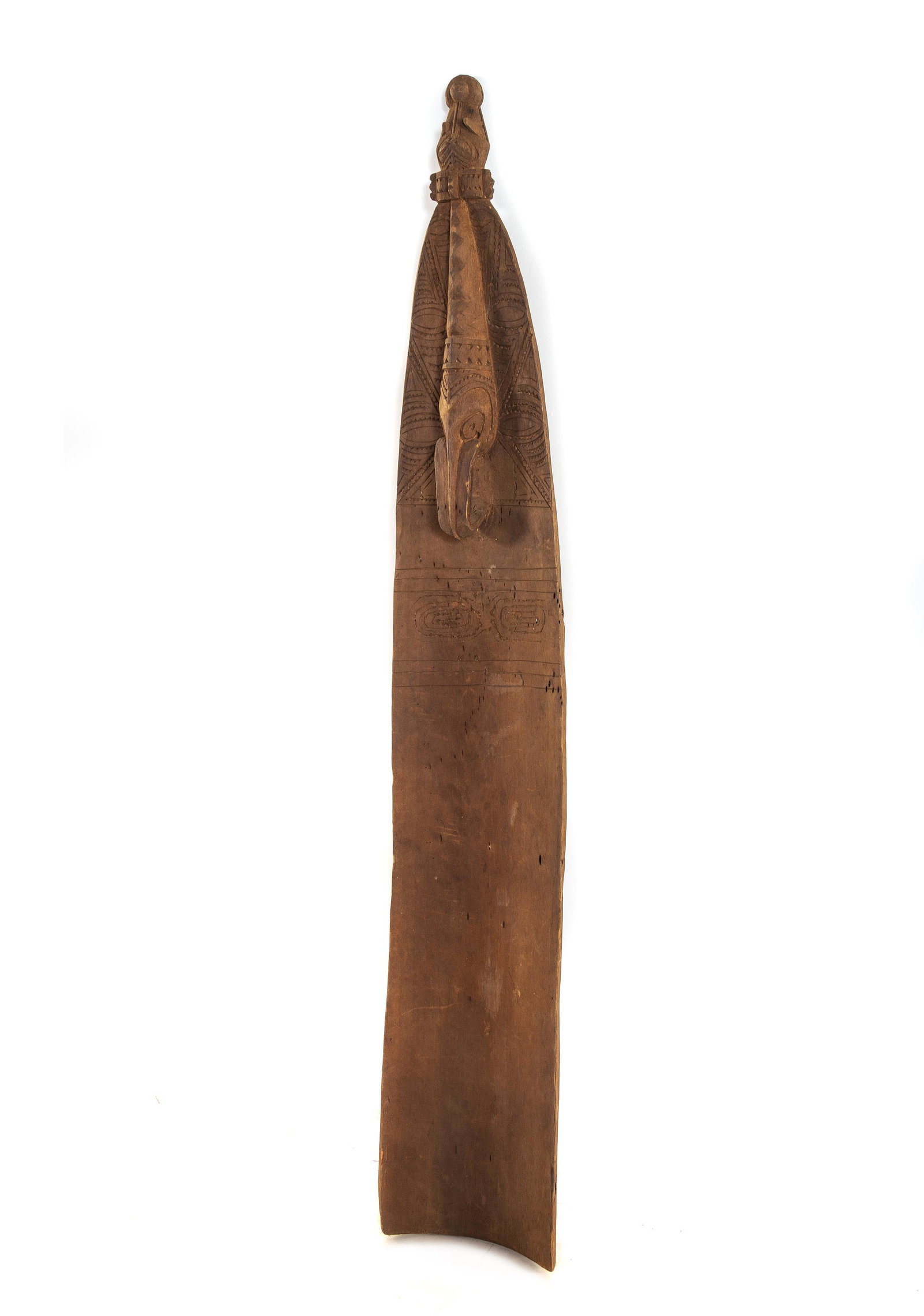 A Hand-Carved Wood Totem: A Hand-Carved Wood Totem Papua New Guinea, Early 20th Century Height 53 x width 6 1/4 x depth 4 inches.