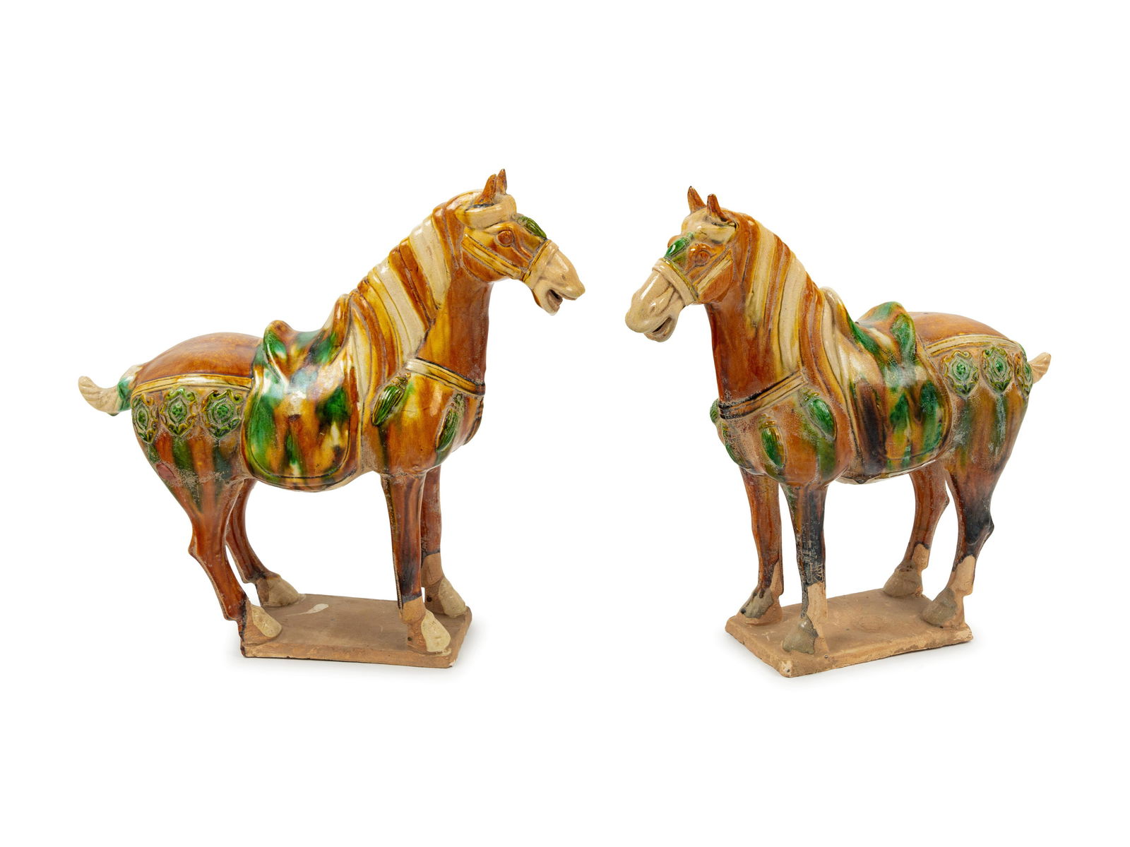 A Pair of Chinese Sancai Pottery Horses: A Pair of Chinese Sancai Pottery Horses 20th Century Width 14 inches. Property from the Collection of James Flynn and Bill Wiley, Chicago, Illinois