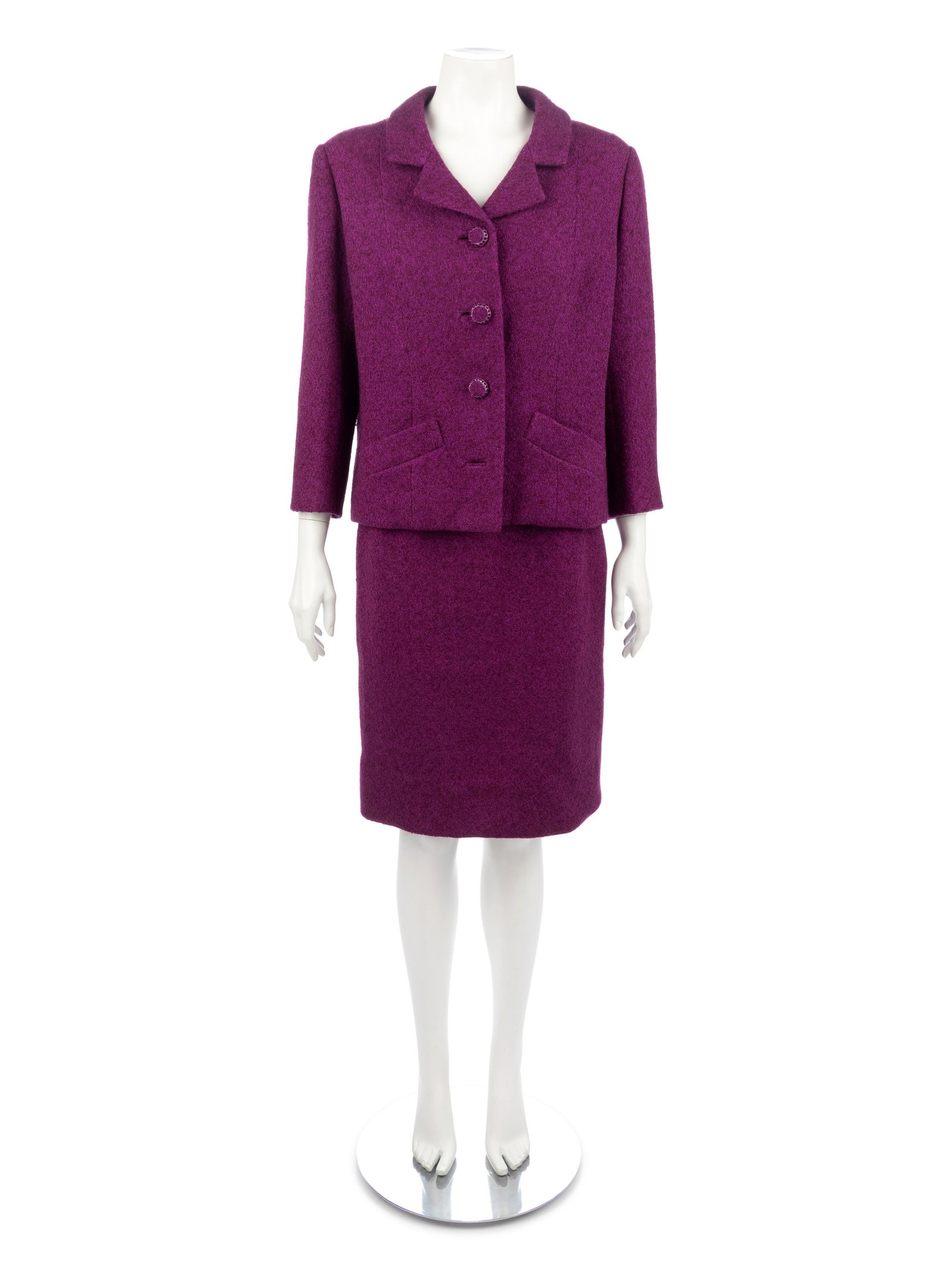 Balenciaga Haute Couture Suit, 1967: Balenciaga Haute Couture Suit, 1967 Purple wool skirt suit with a short jacket that has a single notch lapel, waist welt pockets, and center front covered button closure paired with a straight fit sam