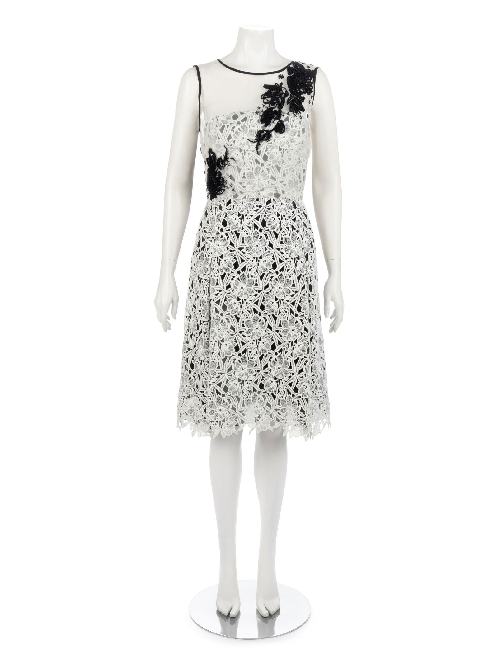 Oscar de la Renta Dress, 2016: Oscar de la Renta Dress, 2016 White lace overlay sleeveless dress with white organza yoke embellished with black ribbon and bugle beads, structured inner bodice, full skirt with back side pleats, and