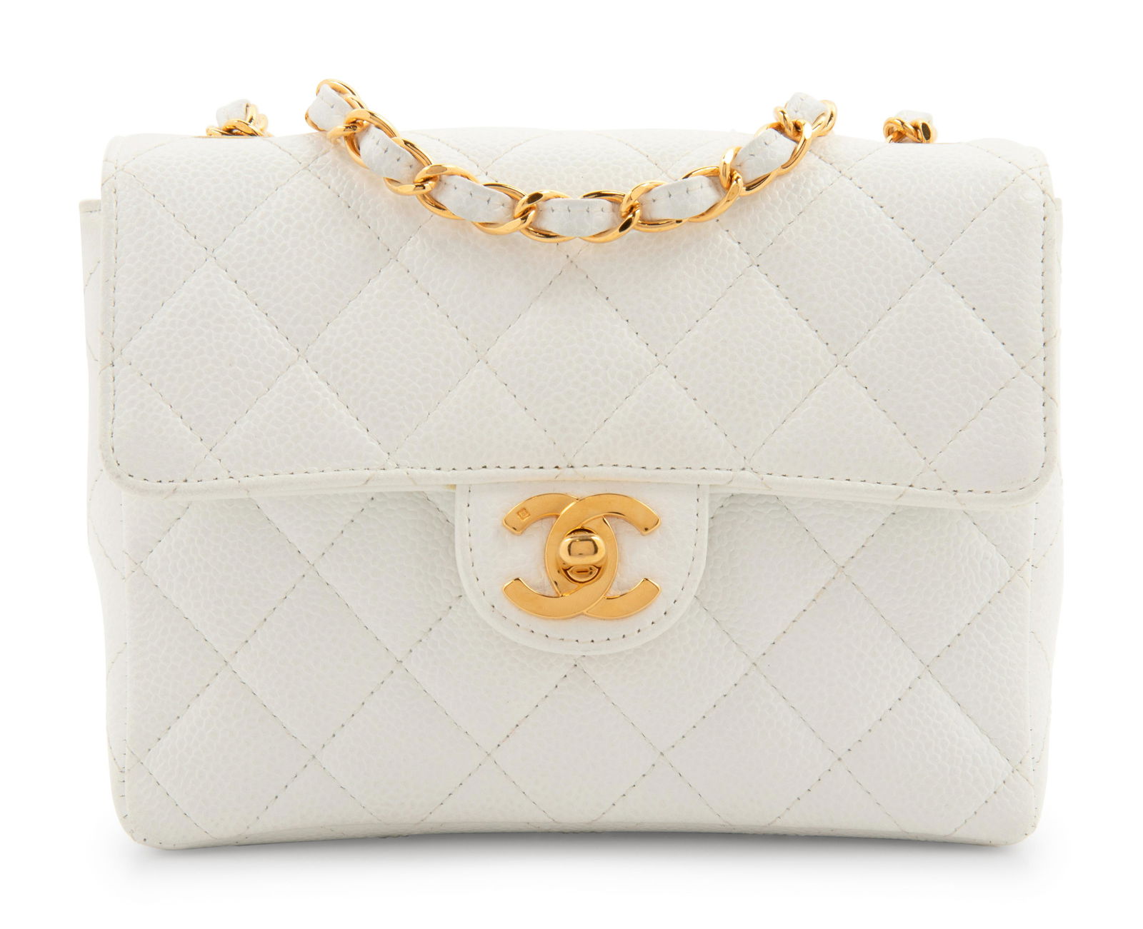 Chanel White Quilted Leather Mini Flap Bag, 1997-99: Chanel White Quilted Leather Mini Flap Bag, 1997-99 White quilted leather mini flap bag with gold-tone CC twist lock, and Mademoiselle chain strap. Comes with a box. Label (stamped): Chanel Serial/Sty