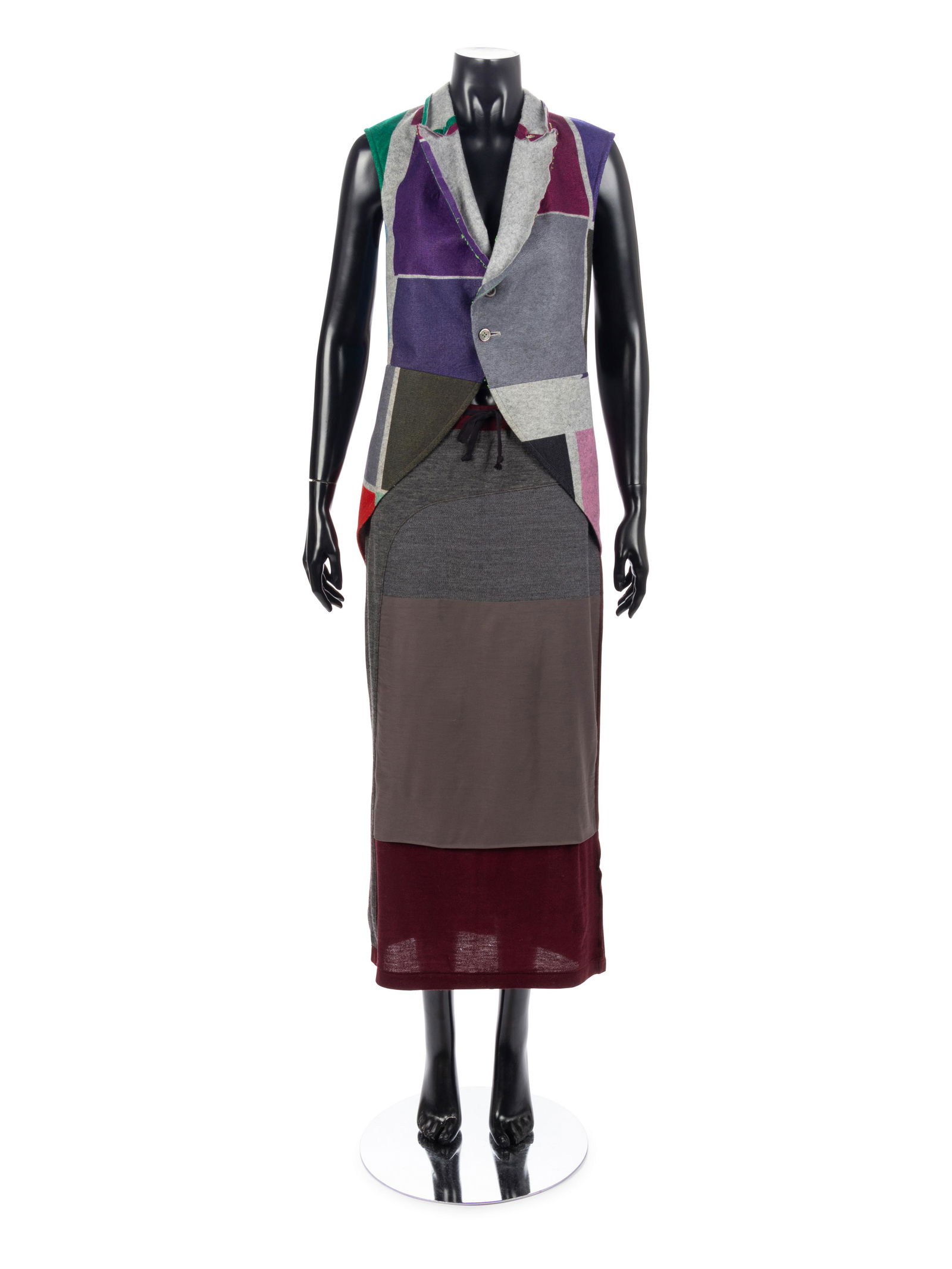 Comme des Garcons Top and Skirt, 1996: Comme des Garcons Top and Skirt, 1996 This ensemble is from the Comme des Garcons S/S '96, Kaleidoscope Collection.† Color block wool felt vest with notched lapel and scooped back hemline paired