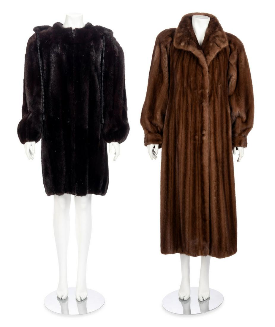Two Mink Fur Coats, 1980-90s: Two Mink Fur Coats, 1980-90s This lot includes two fur coats.† THE FIRST Dark brown mink fur hooded coat with braided cord tie and front zipper closure. Monogrammed with "D A M" front right lini
