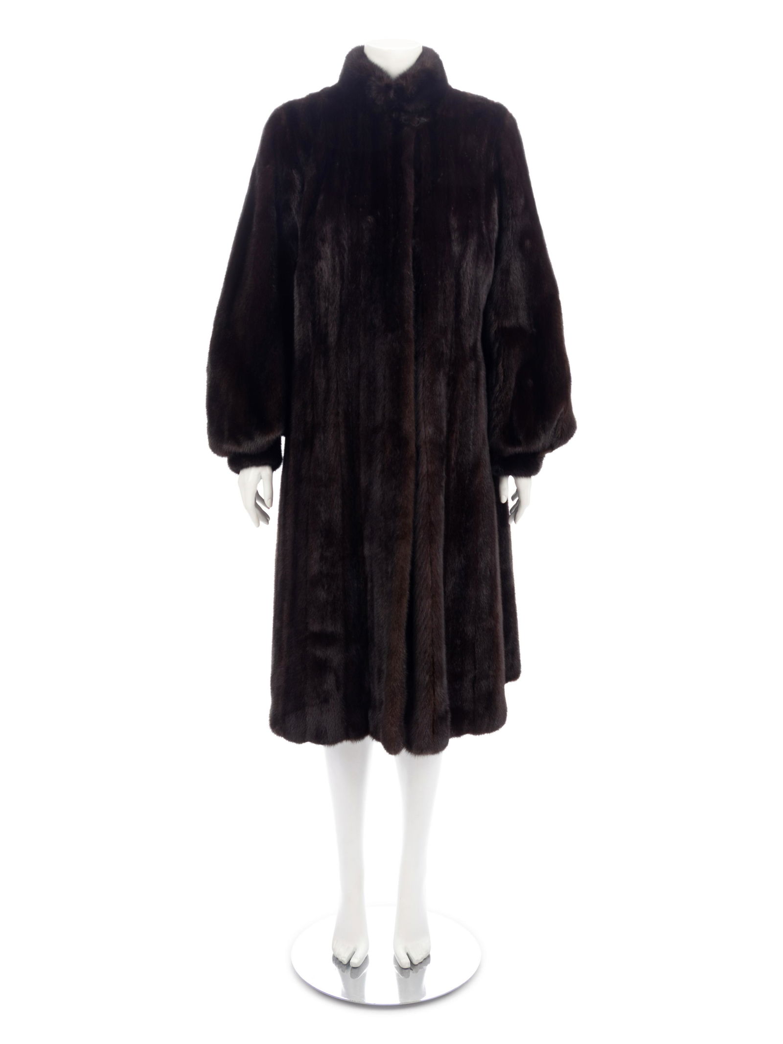 Long Dark Brown Mink Coat with Full Sleeves, 1990-2010s: Long Dark Brown Mink Coat with Full Sleeves, 1990-2010s Long brown mink fur coat with banded collar, full cuffed sleeves, and front hinged clasp closures. Embroidered in the front right lining "JCD".