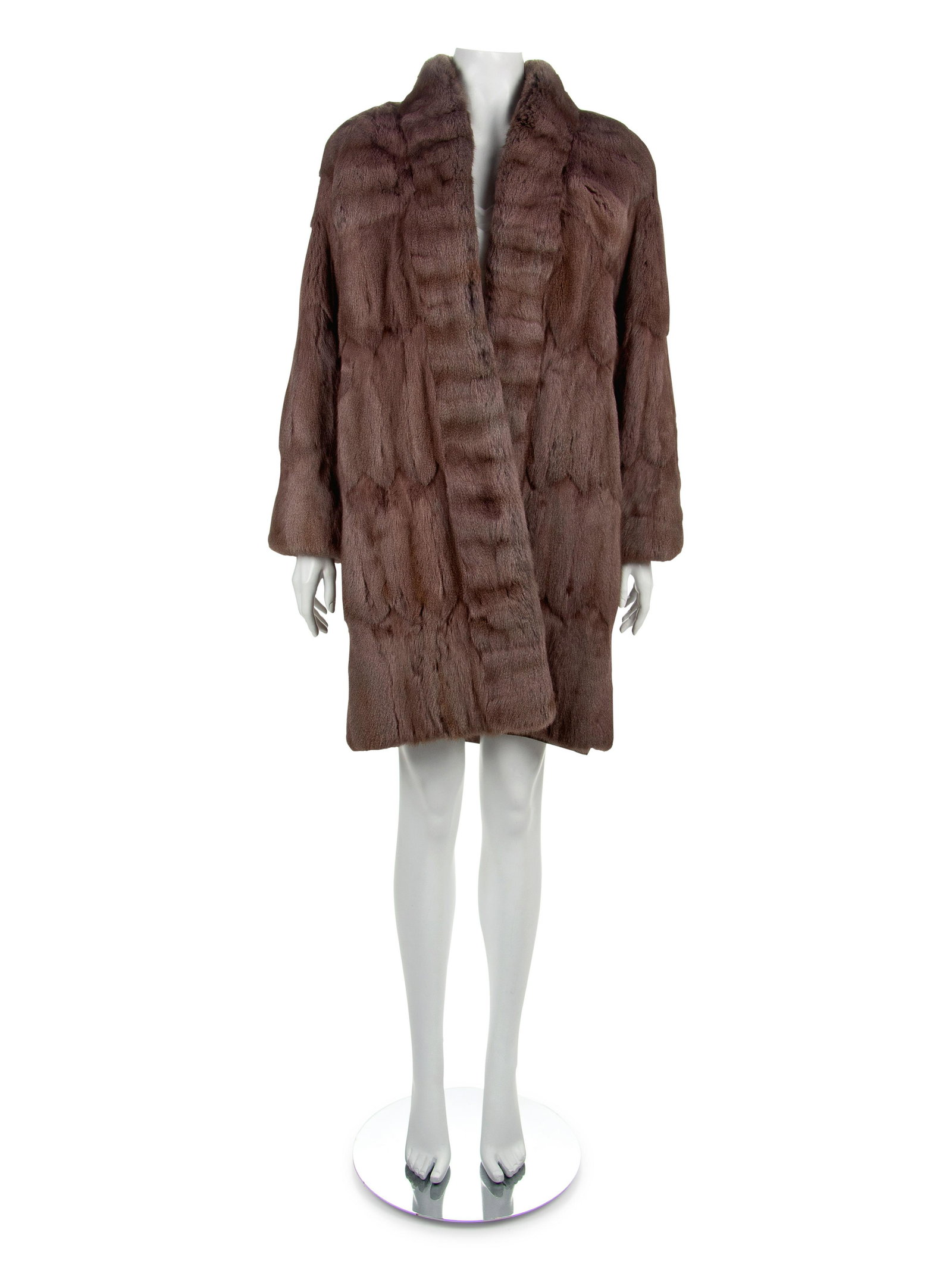 Fendi by Karl Lagerfeld Fur Coat, 1990-2000s: Fendi by Karl Lagerfeld Russian Squirrel Coat, 1990-2000s Mauve Russian squirrel coat with stand collar that extends down the center front edges and long sleeves. The center front is without a closure